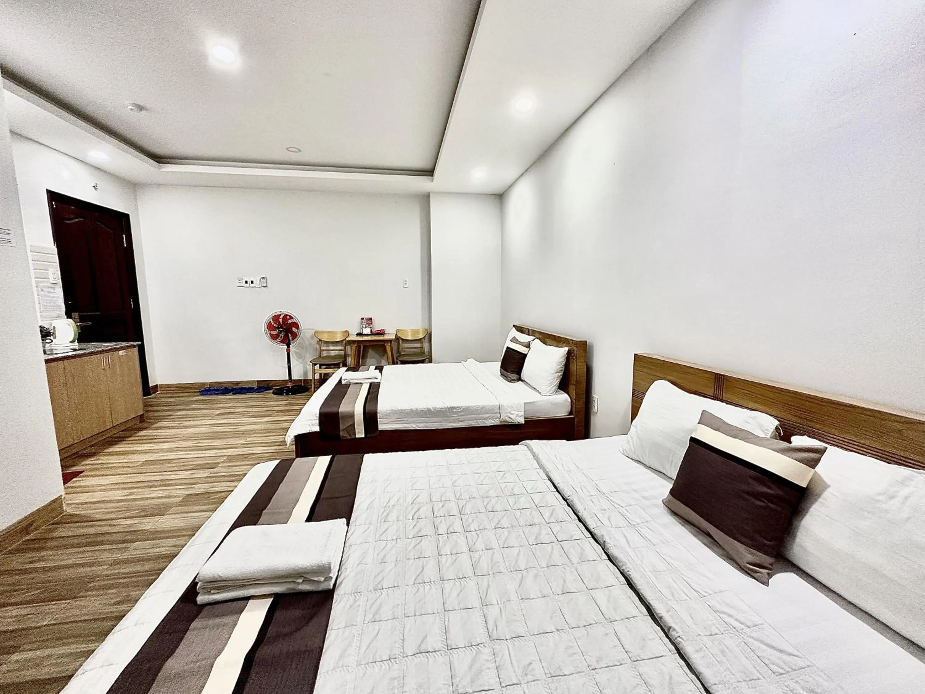 Bed in The Jade Hotel near Tan Son Nhat Airport