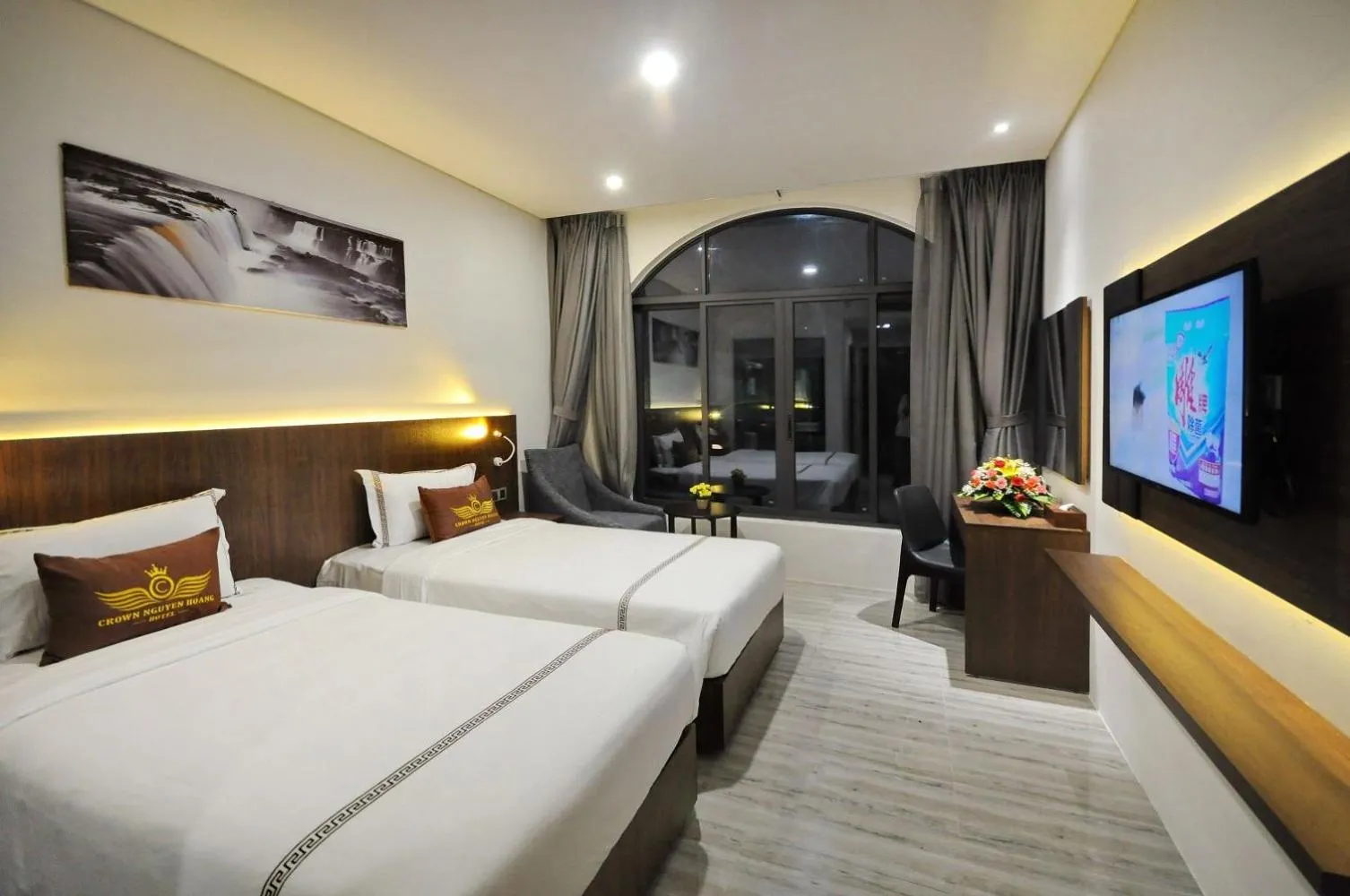Communal lounge/ TV room, Bed in Crown Nguyen Hoang Hotel