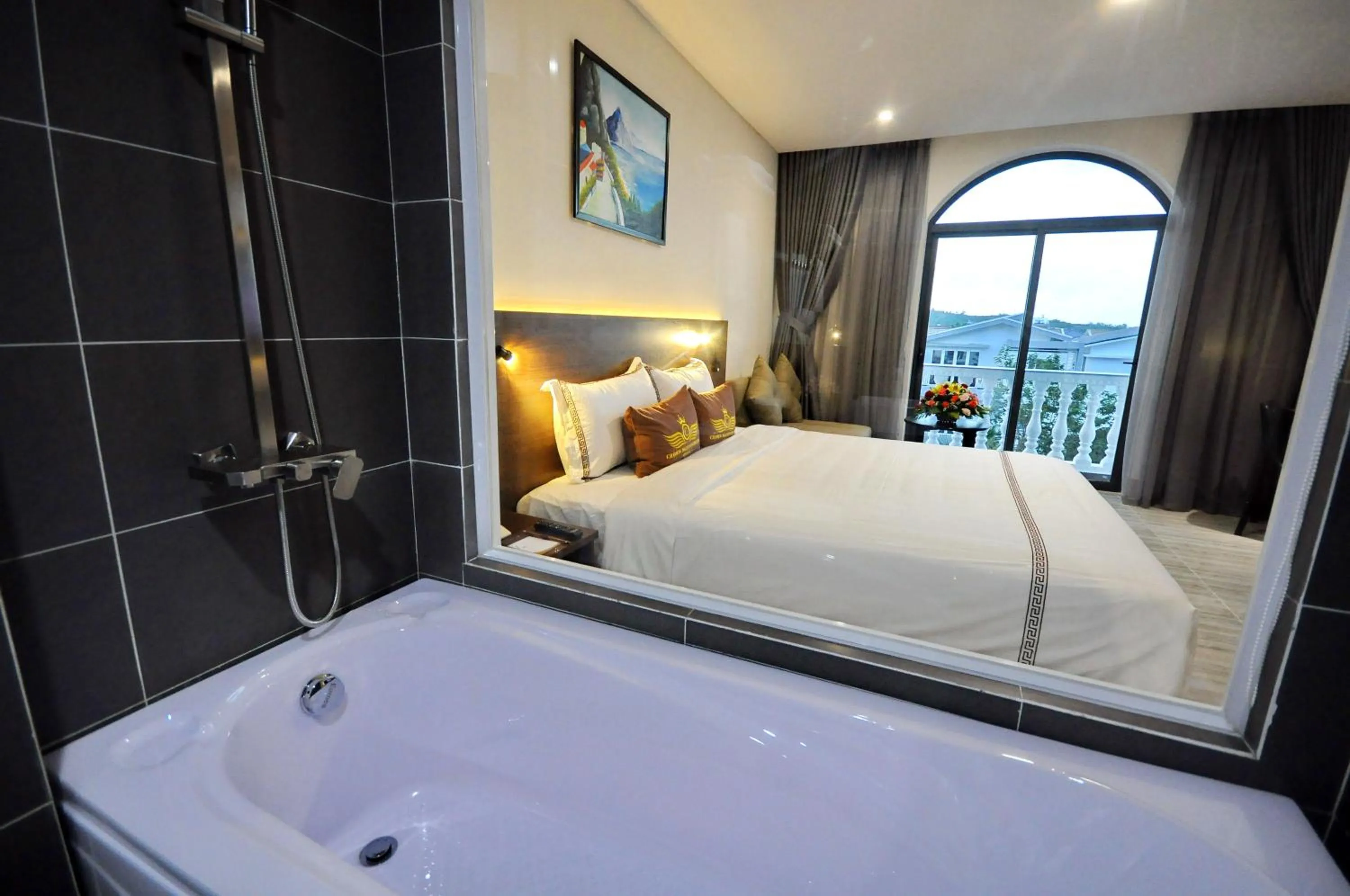 Bed in Crown Nguyen Hoang Hotel