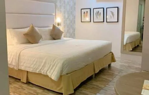 Bed in Amethyst Boutique Hotel Cebu powered by Cocotel