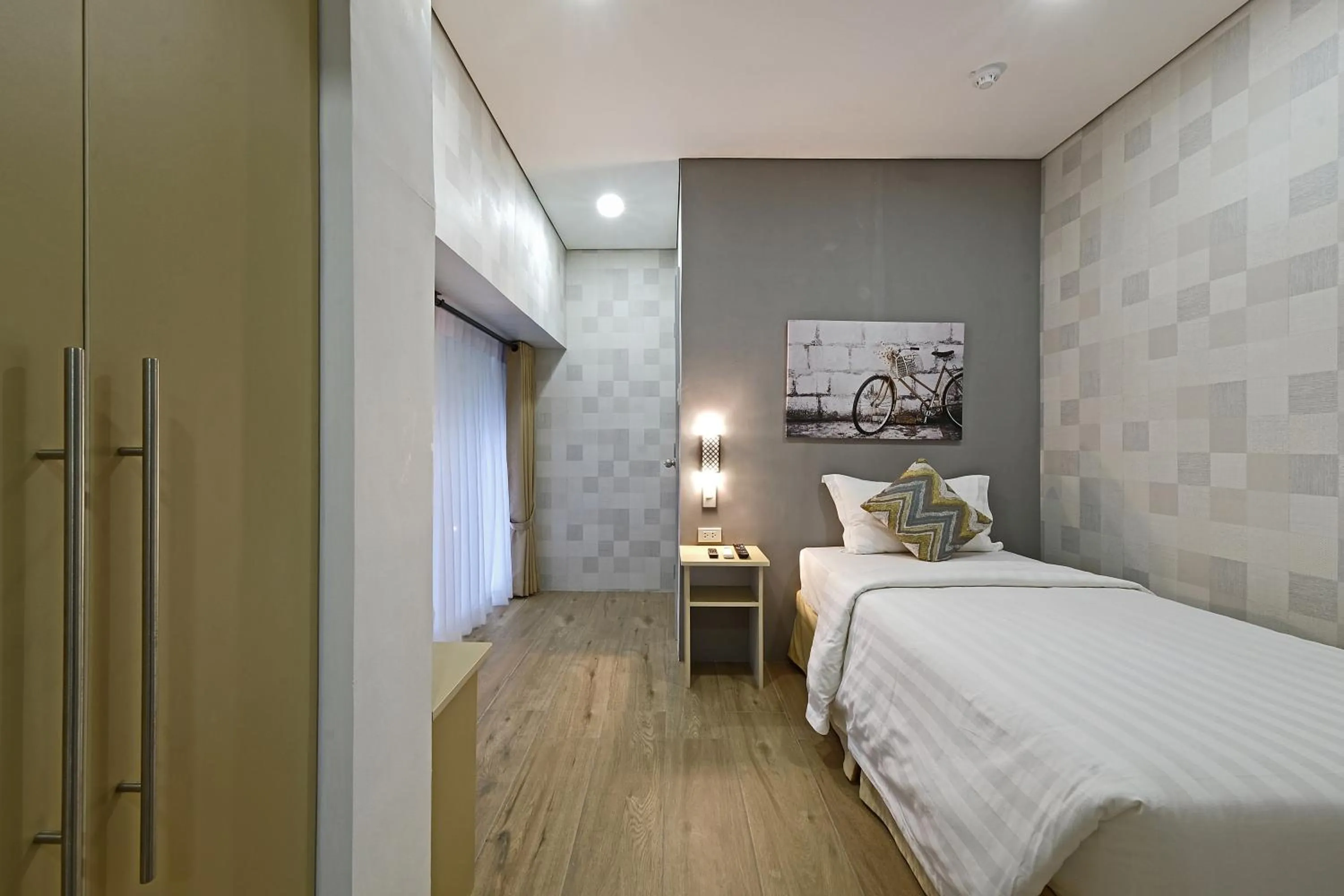 Bed in Amethyst Boutique Hotel Cebu powered by Cocotel