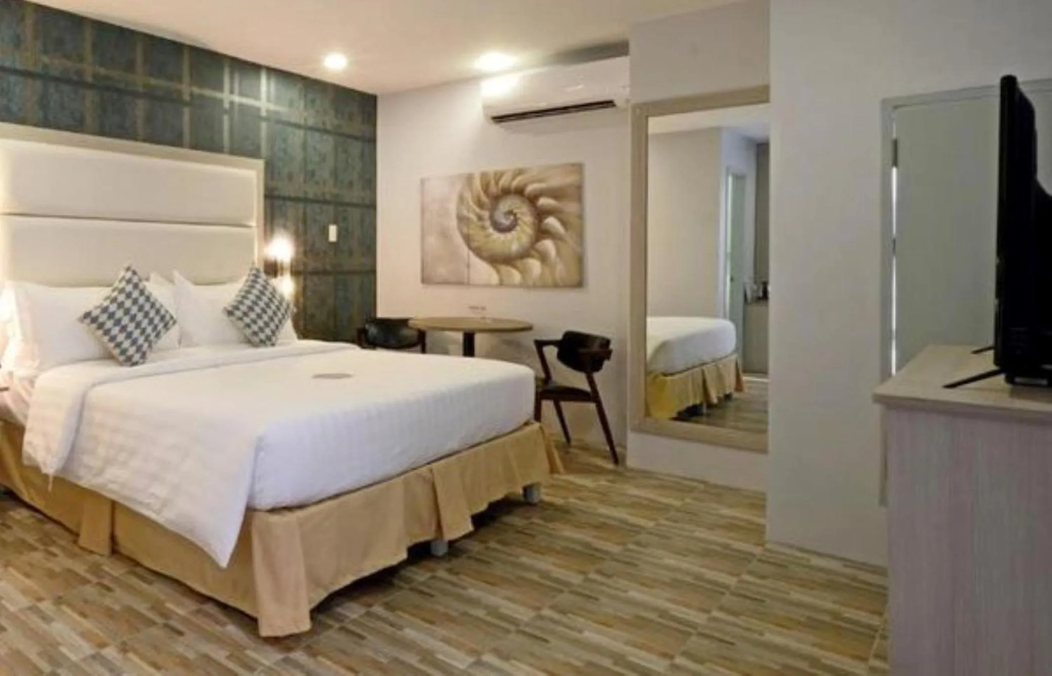 Bed in Amethyst Boutique Hotel Cebu powered by Cocotel