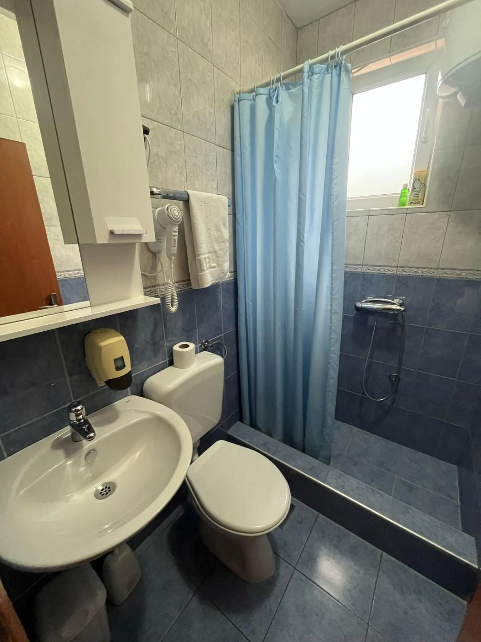 Shower in Motel Aura