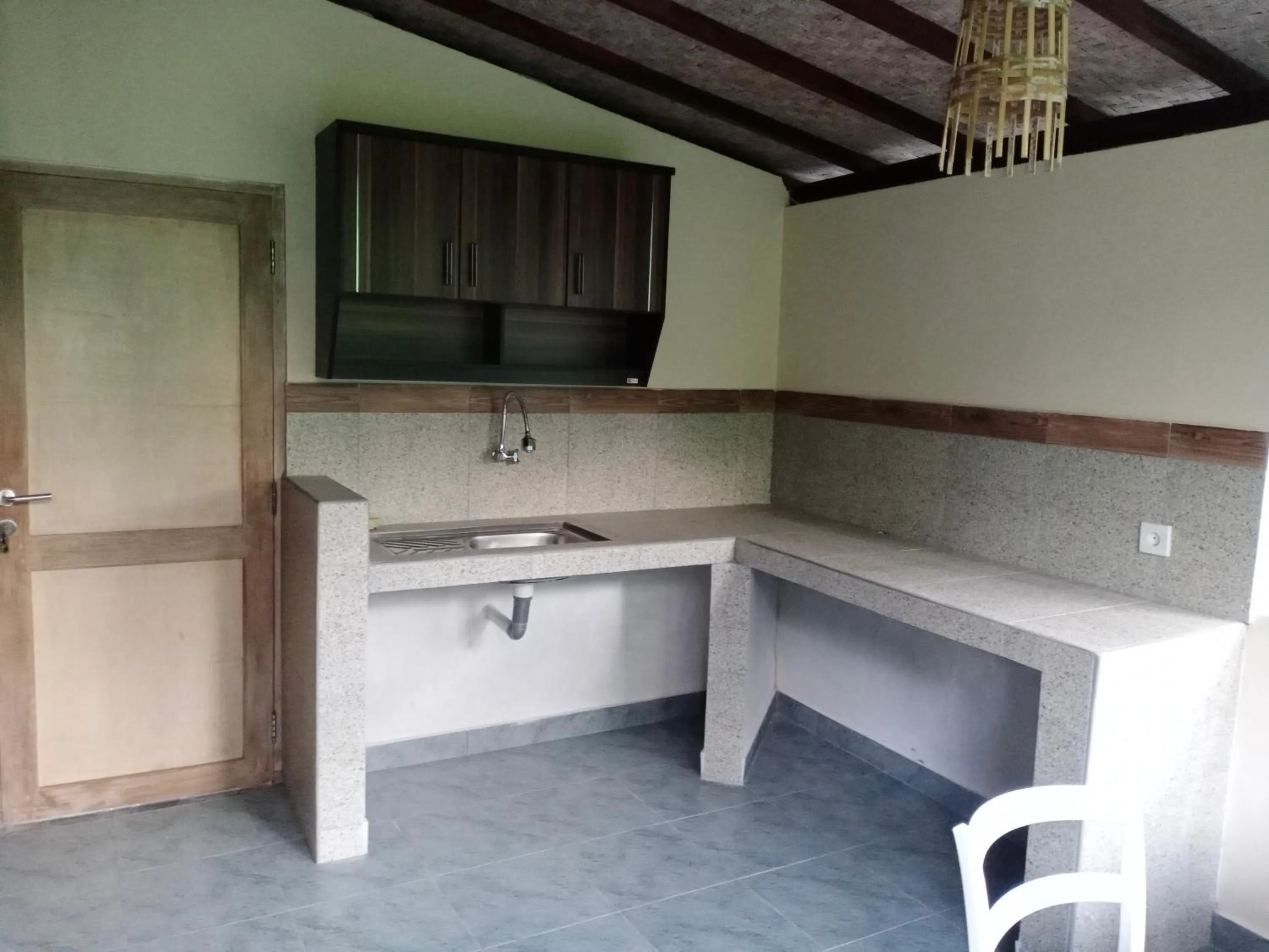 Kitchen or kitchenette in Khrisna Hs and Cottages