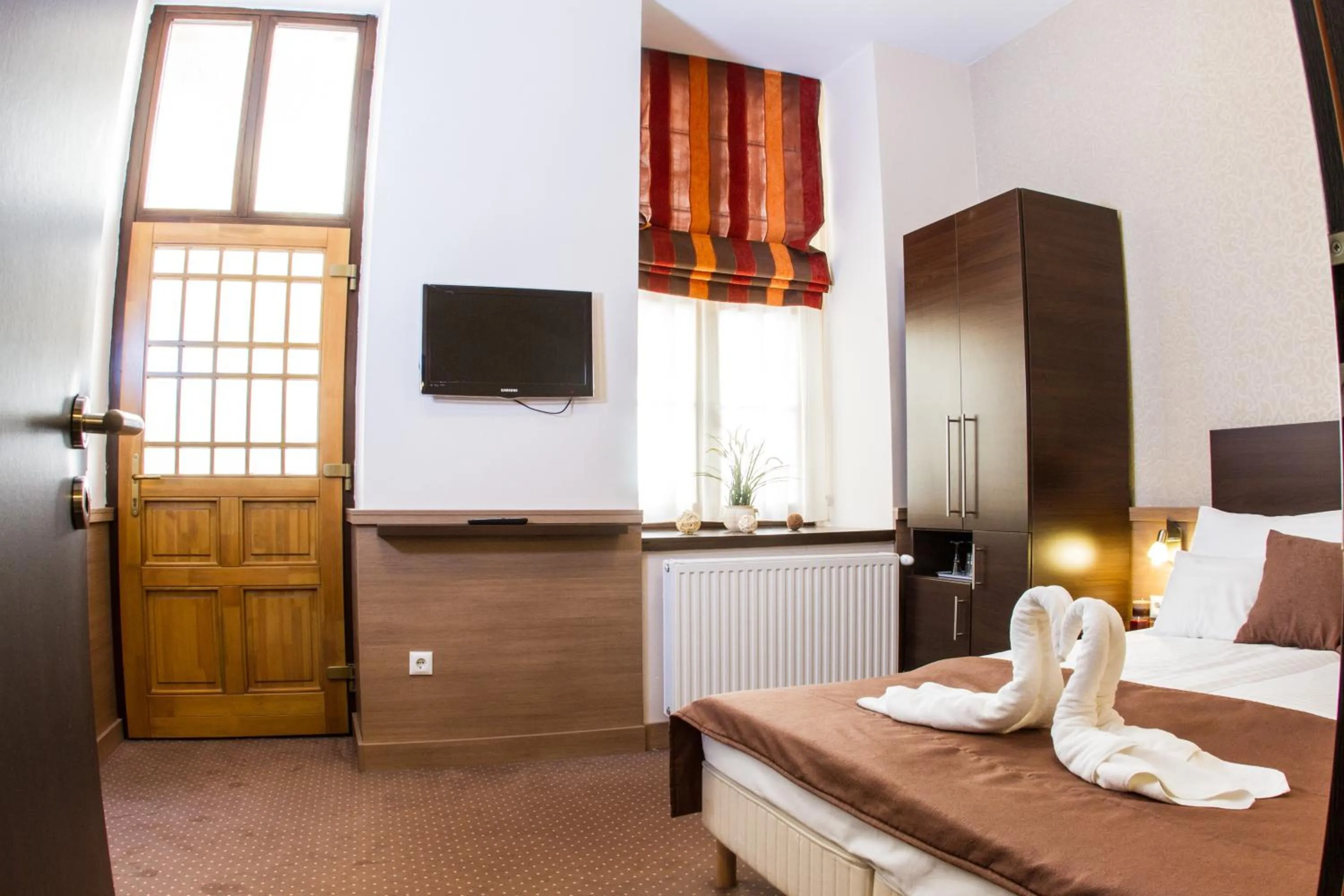 Bedroom, Bed in Central Hotel 21