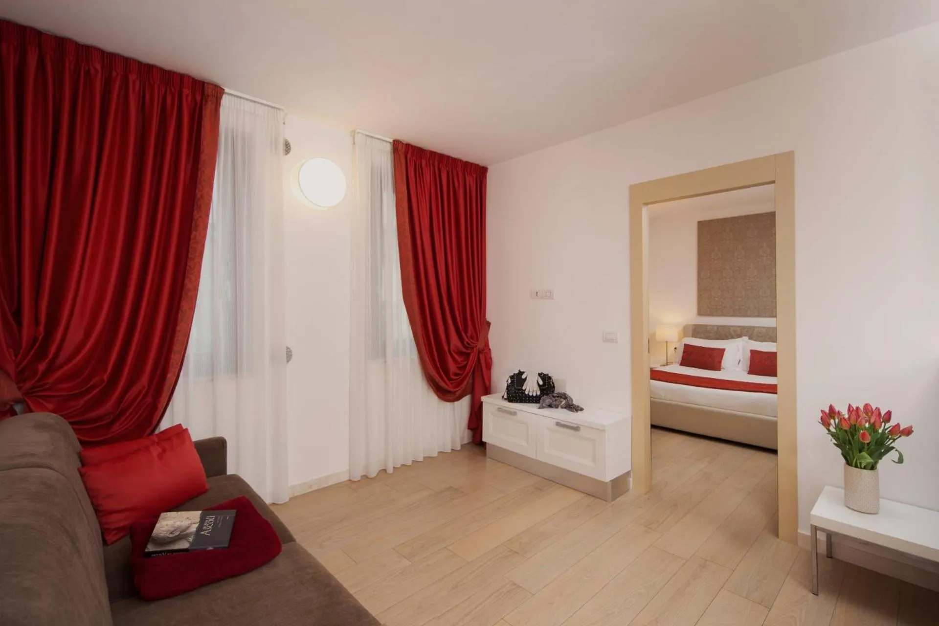 Seating area, Bed in Di Sabatino Resort - Suite Apartments & Spa