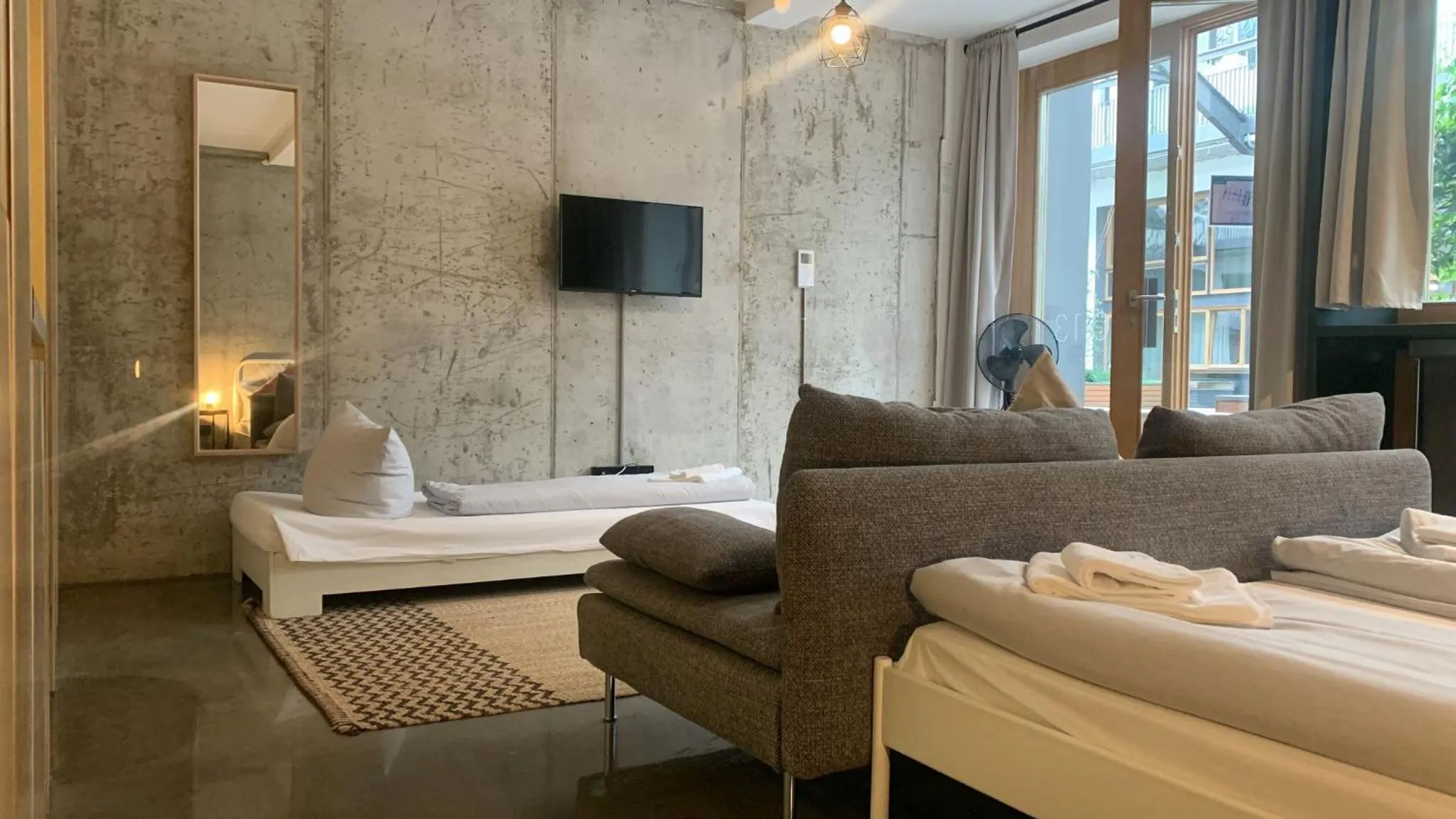 Photo of the whole room in Nena Apartments Metropolpark Berlin - Mitte -Adult Only
