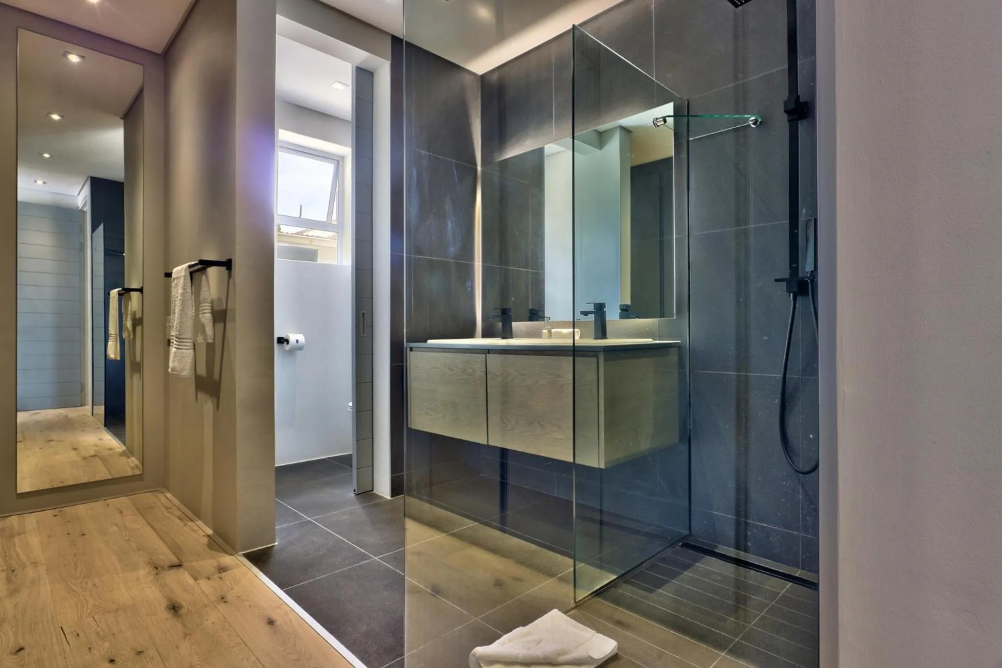 Bathroom in Elements Luxury Suites by Totalstay