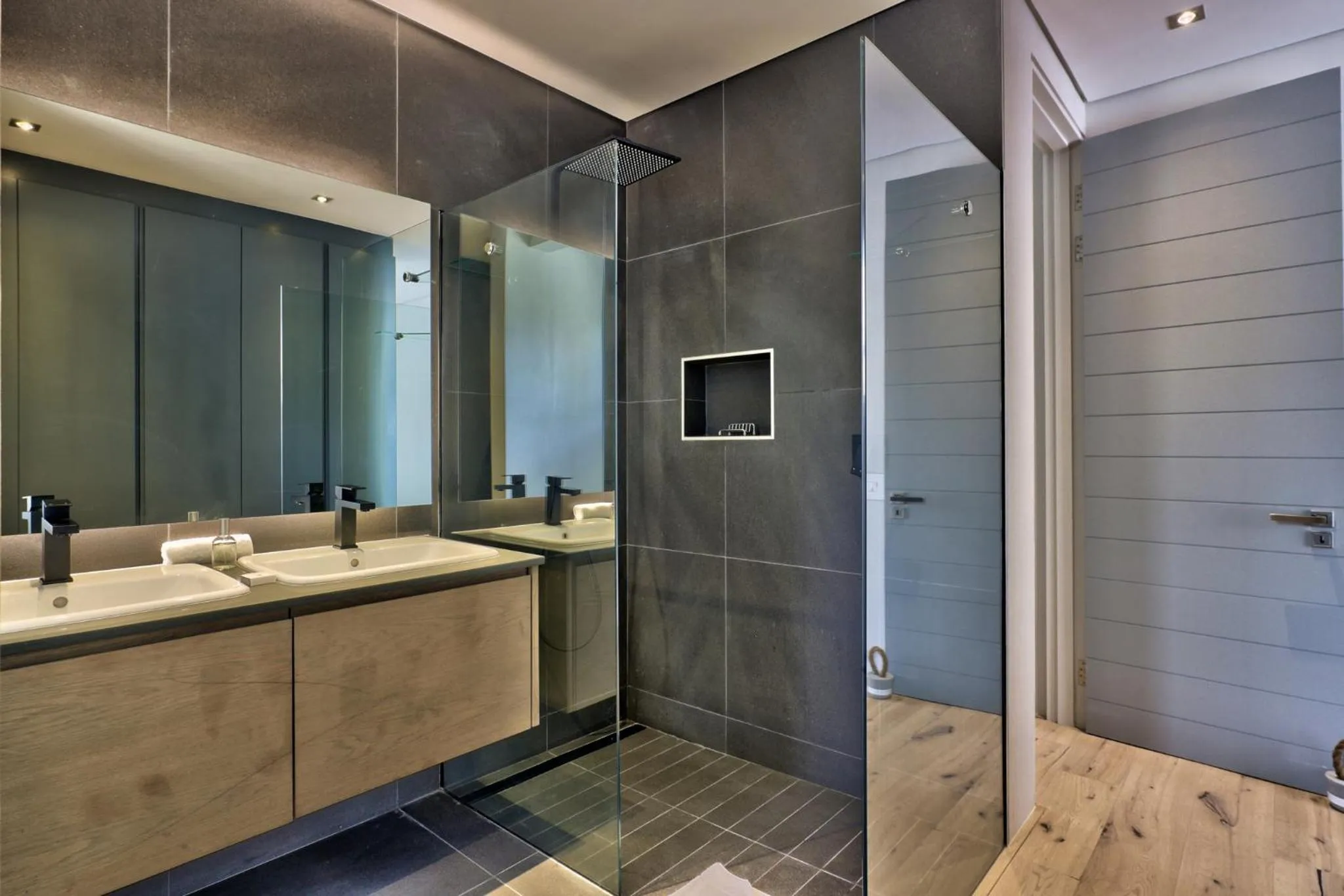 Bathroom in Elements Luxury Suites by Totalstay