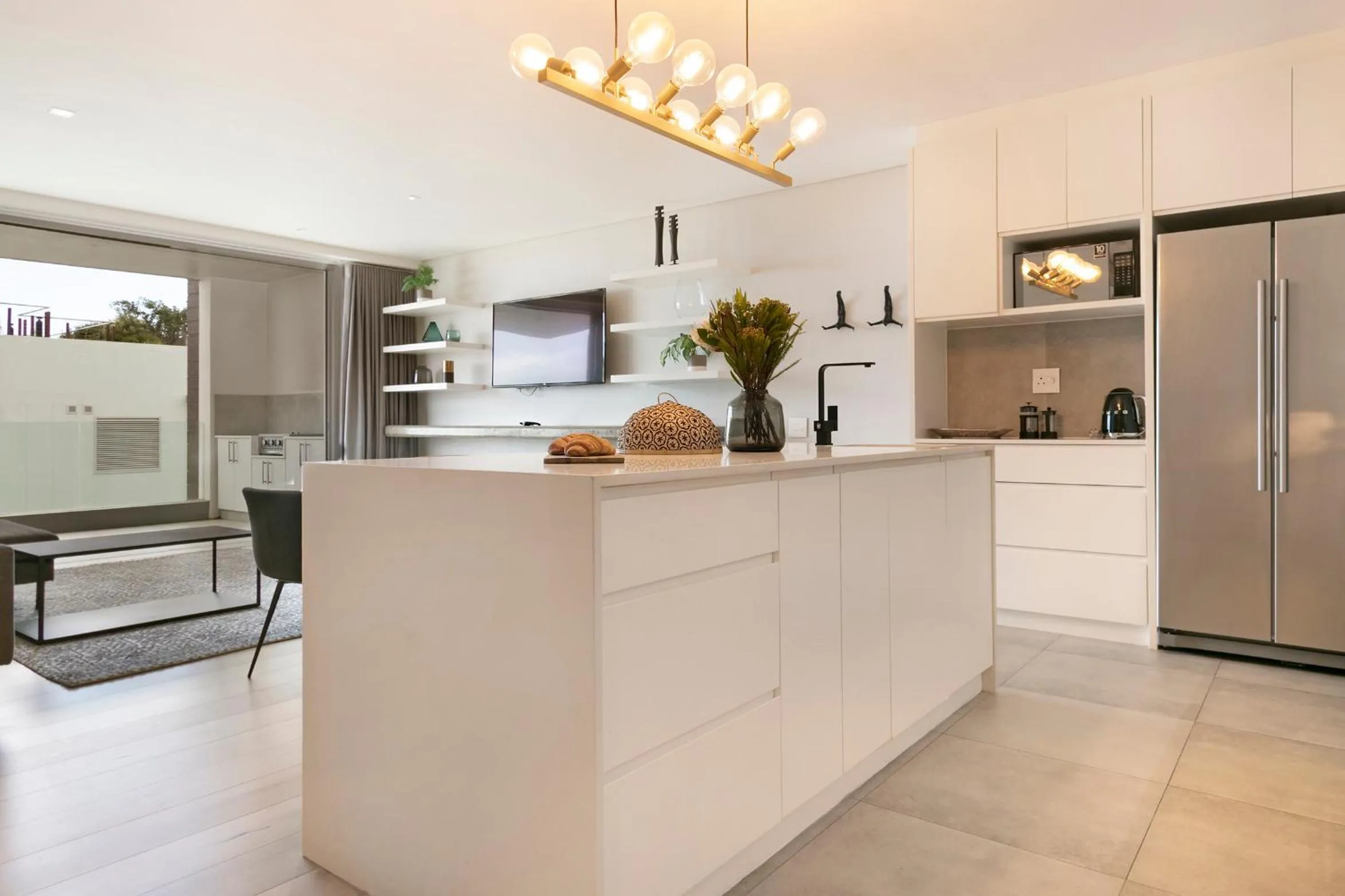 kitchen in Elements Luxury Suites by Totalstay