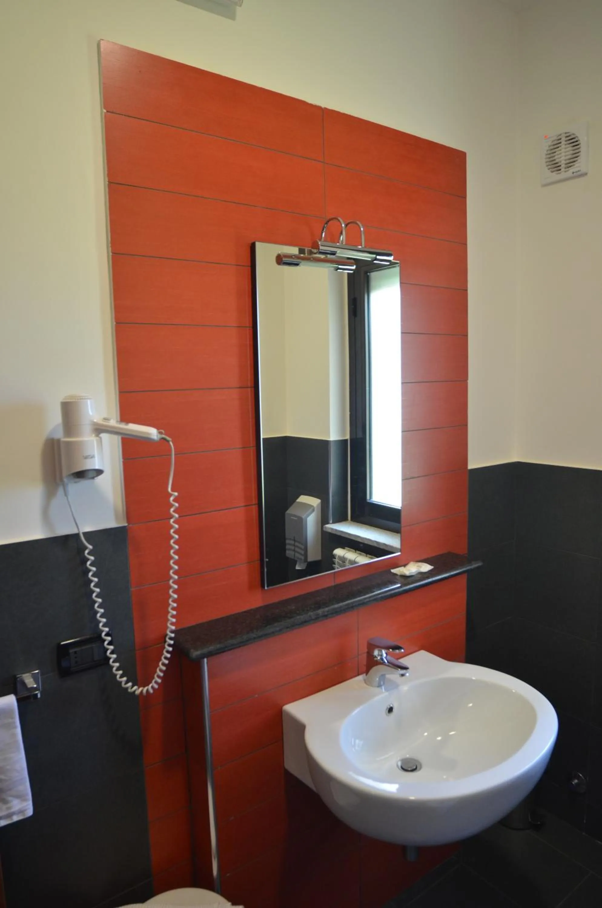 Bathroom in Hotel Toscano