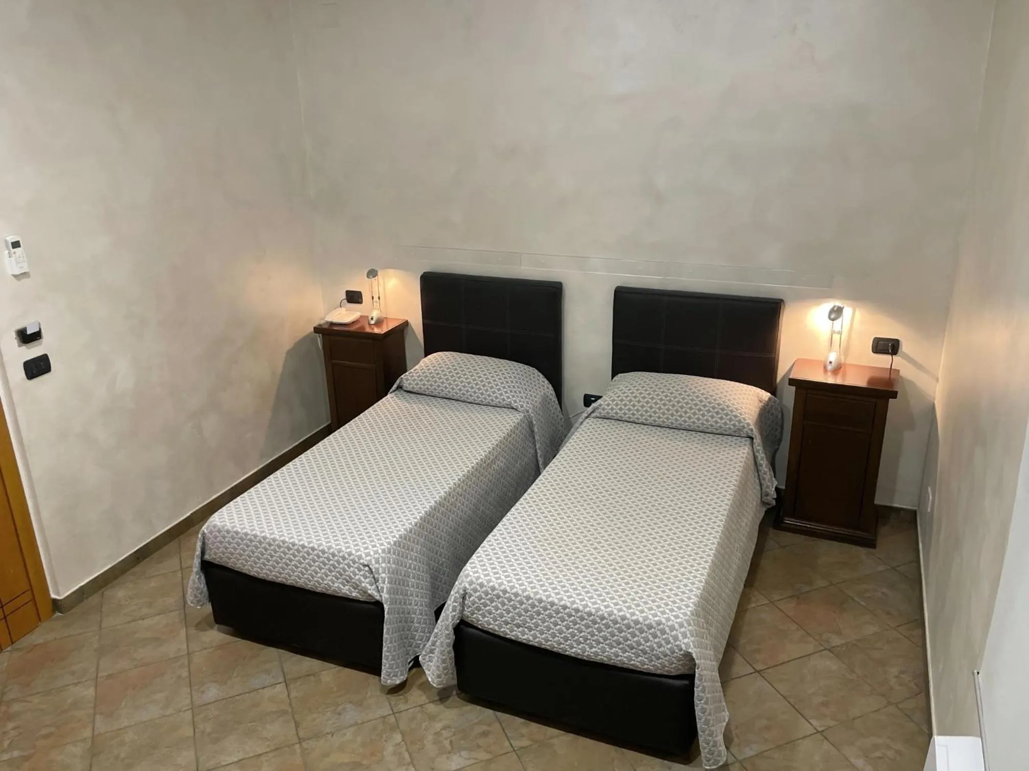 Bed in Hotel Toscano