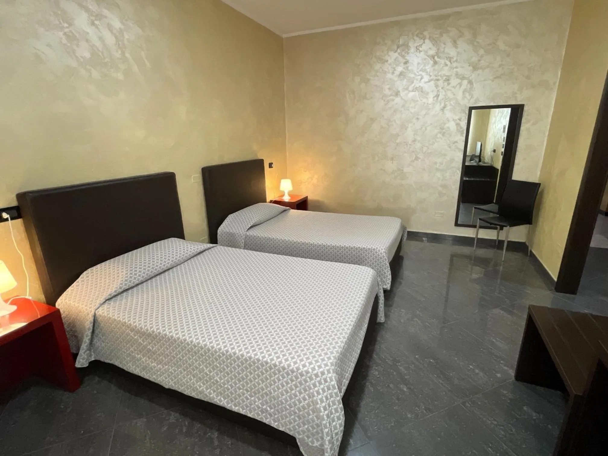 Bed in Hotel Toscano