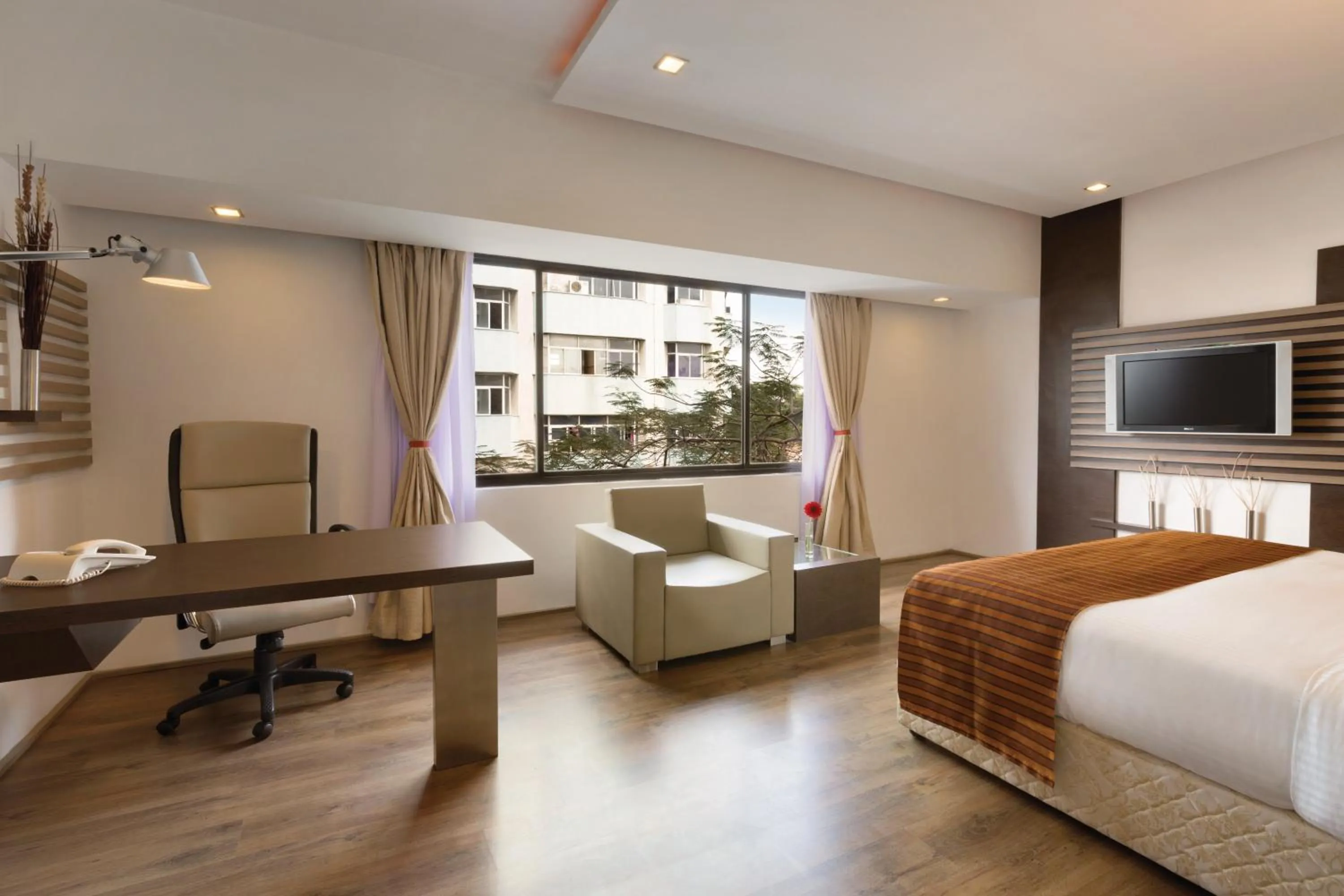 Bedroom, Bed in Ramada by Wyndham Chennai Egmore