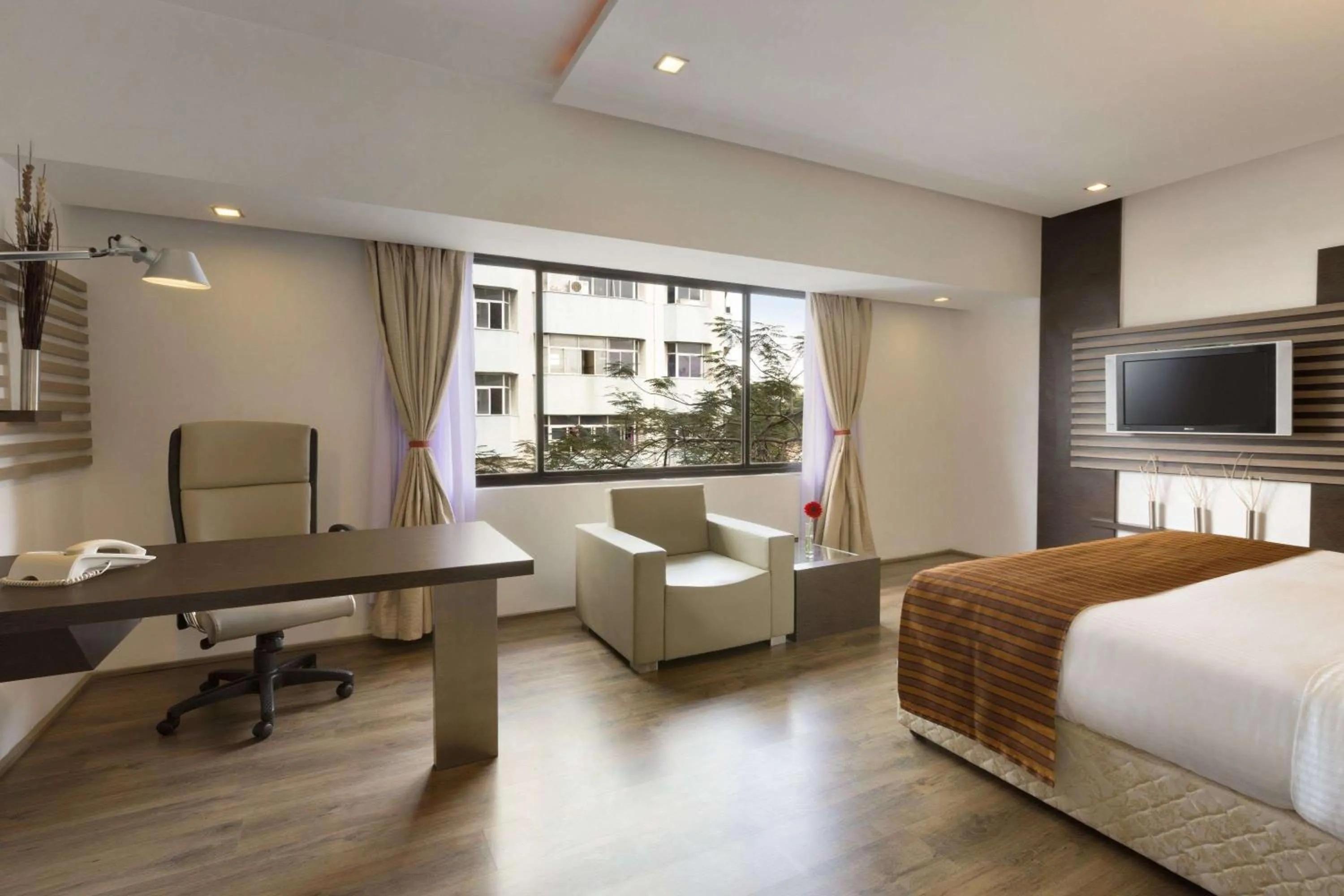 Photo of the whole room, Bed in Ramada by Wyndham Chennai Egmore