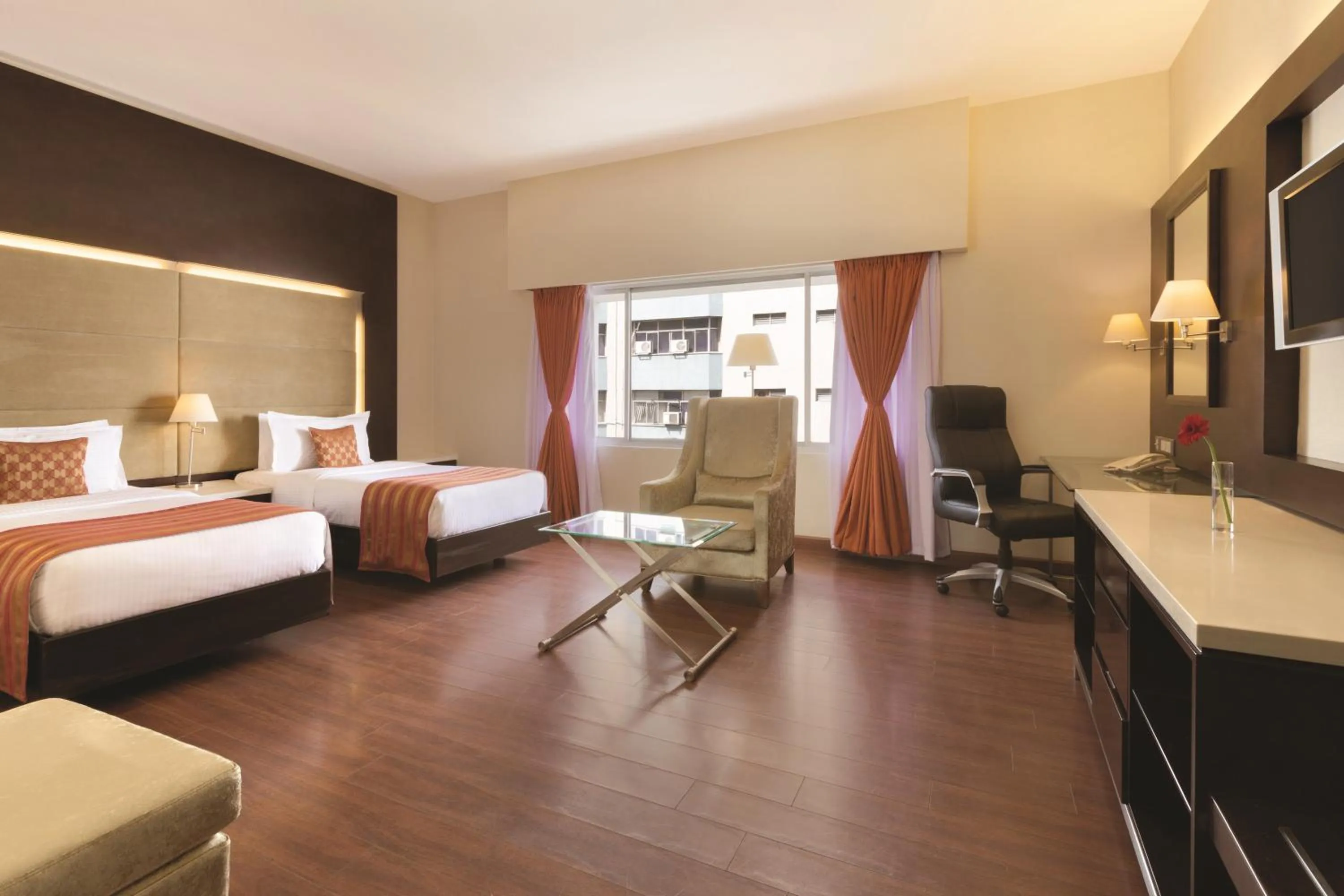 Bed in Ramada by Wyndham Chennai Egmore