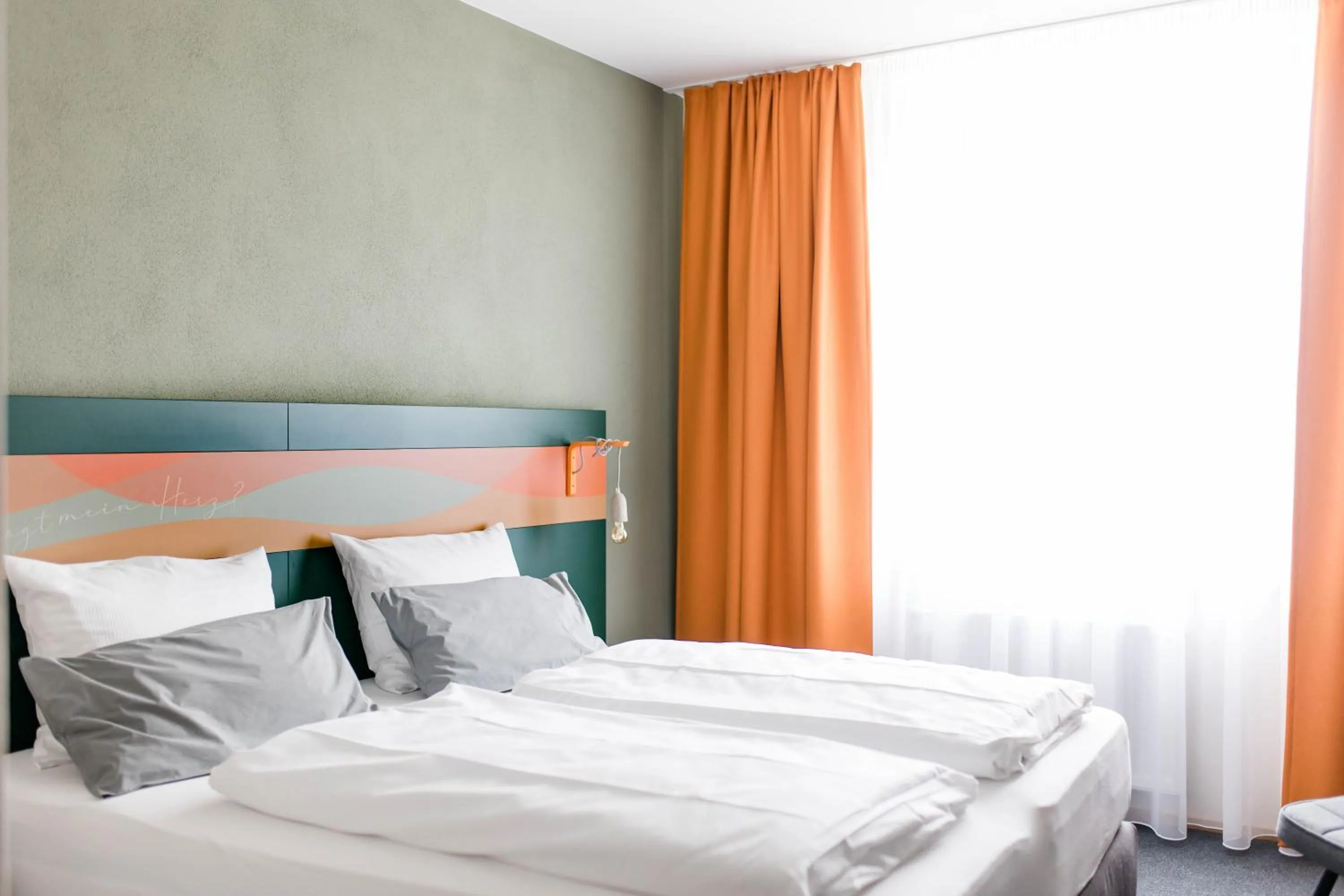 Bed in Stadthotel Freilassing