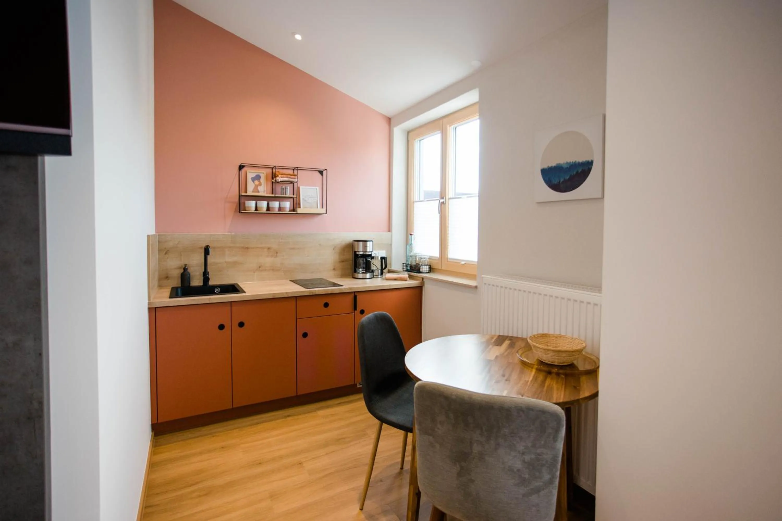 Kitchen or kitchenette in Stadthotel Freilassing