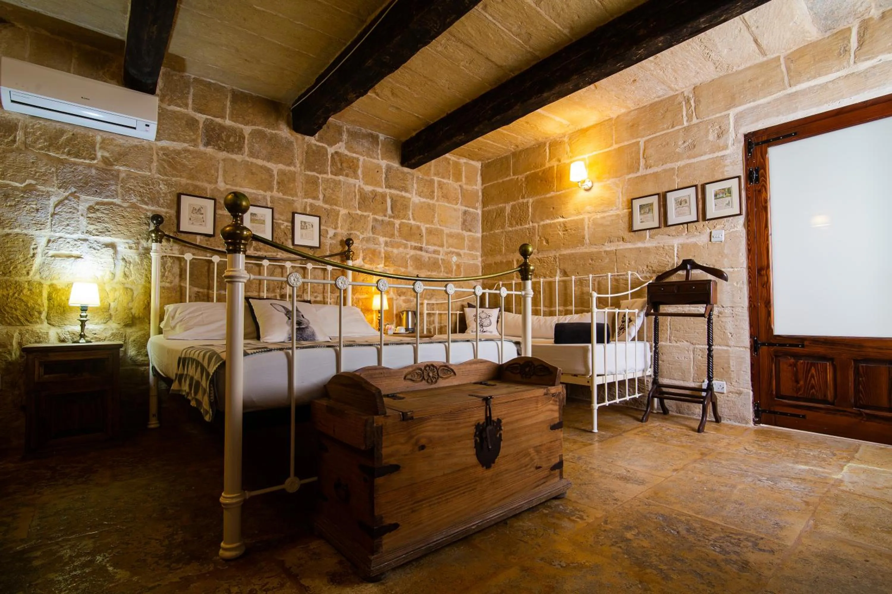 Bed in The Burrow Guest House
