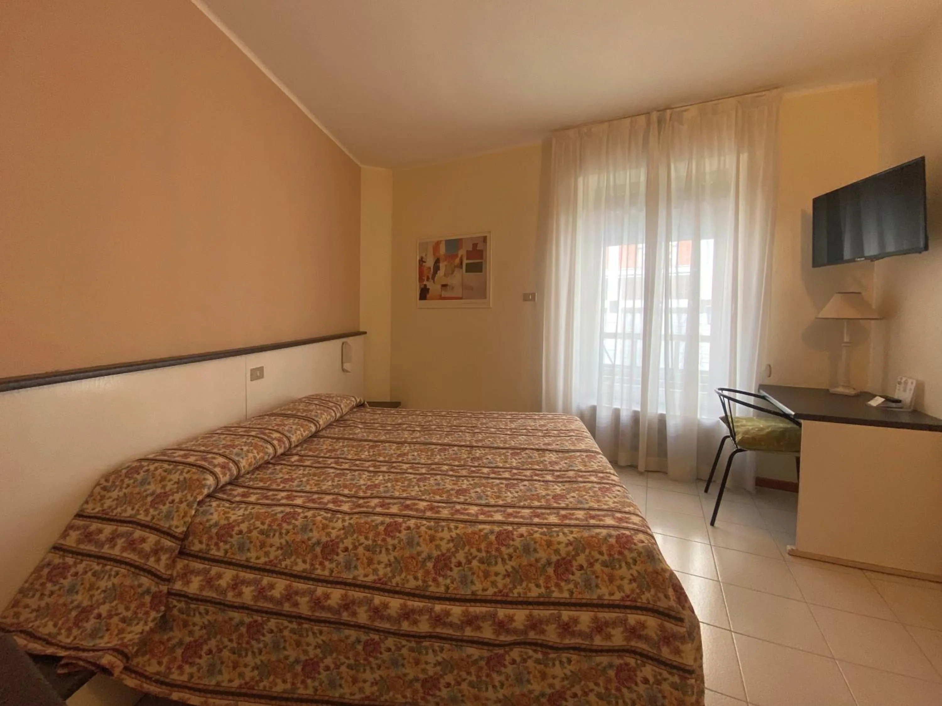 Bed in Hotel Rainero