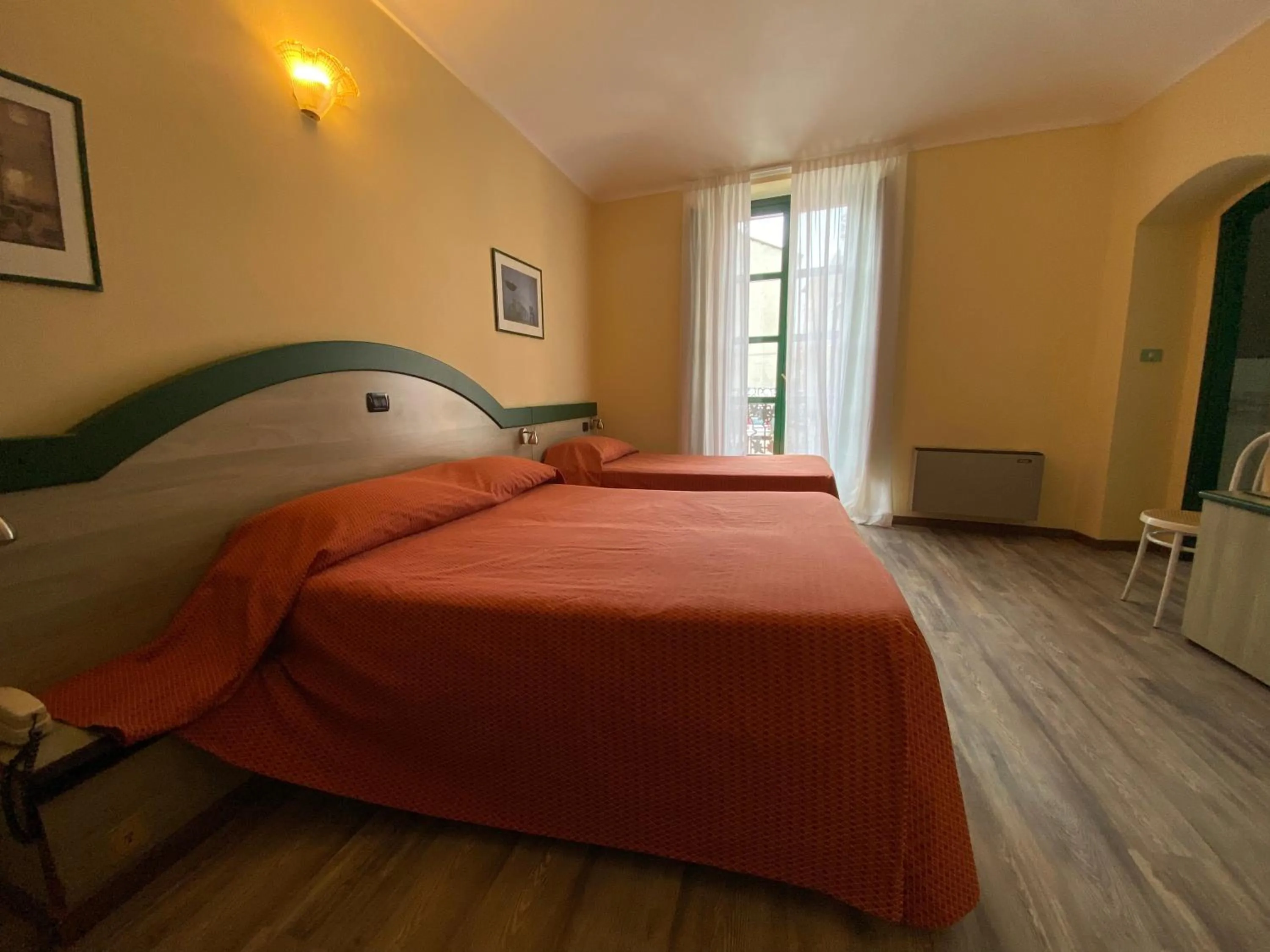 Bed in Hotel Rainero