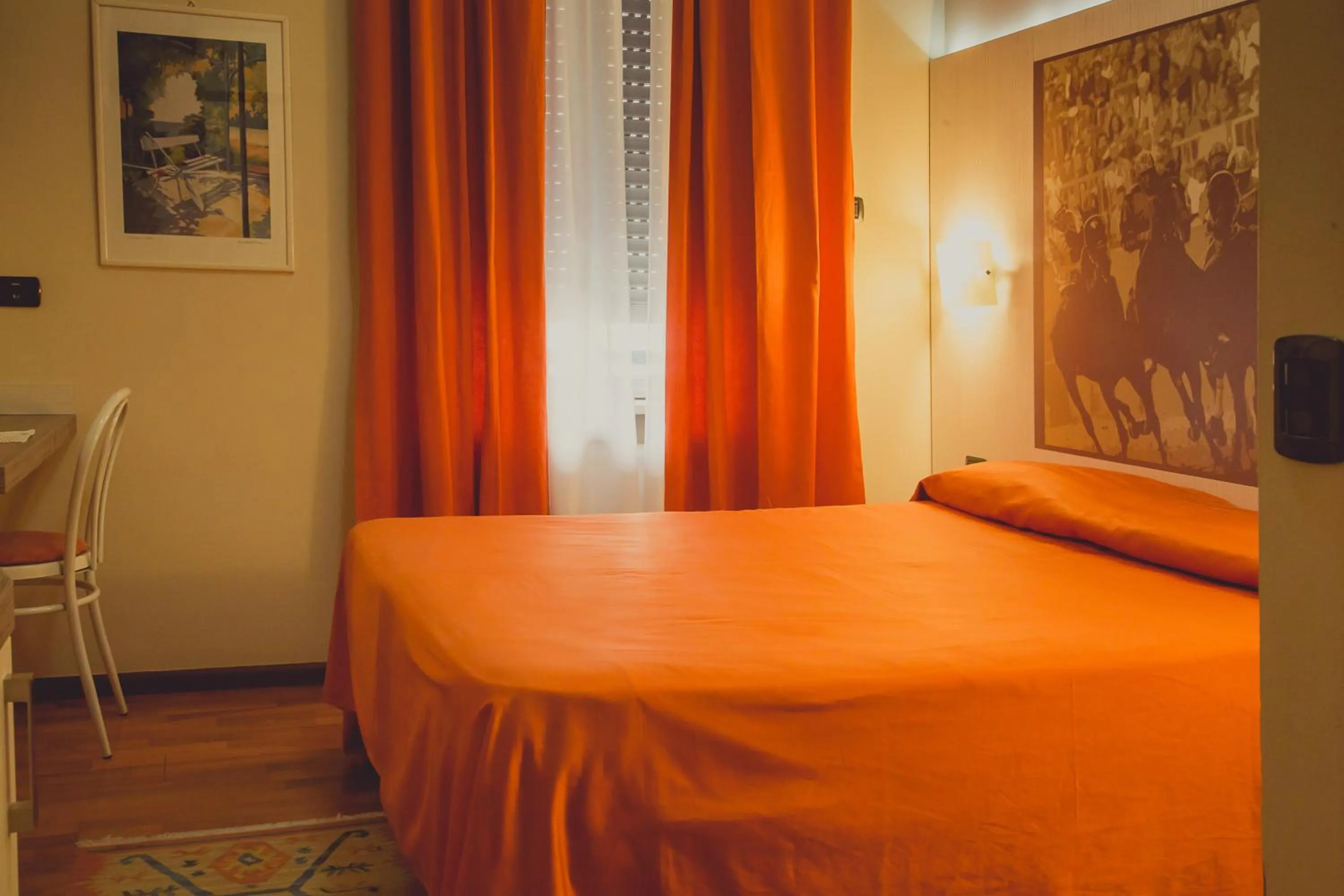 Bed in Hotel Rainero