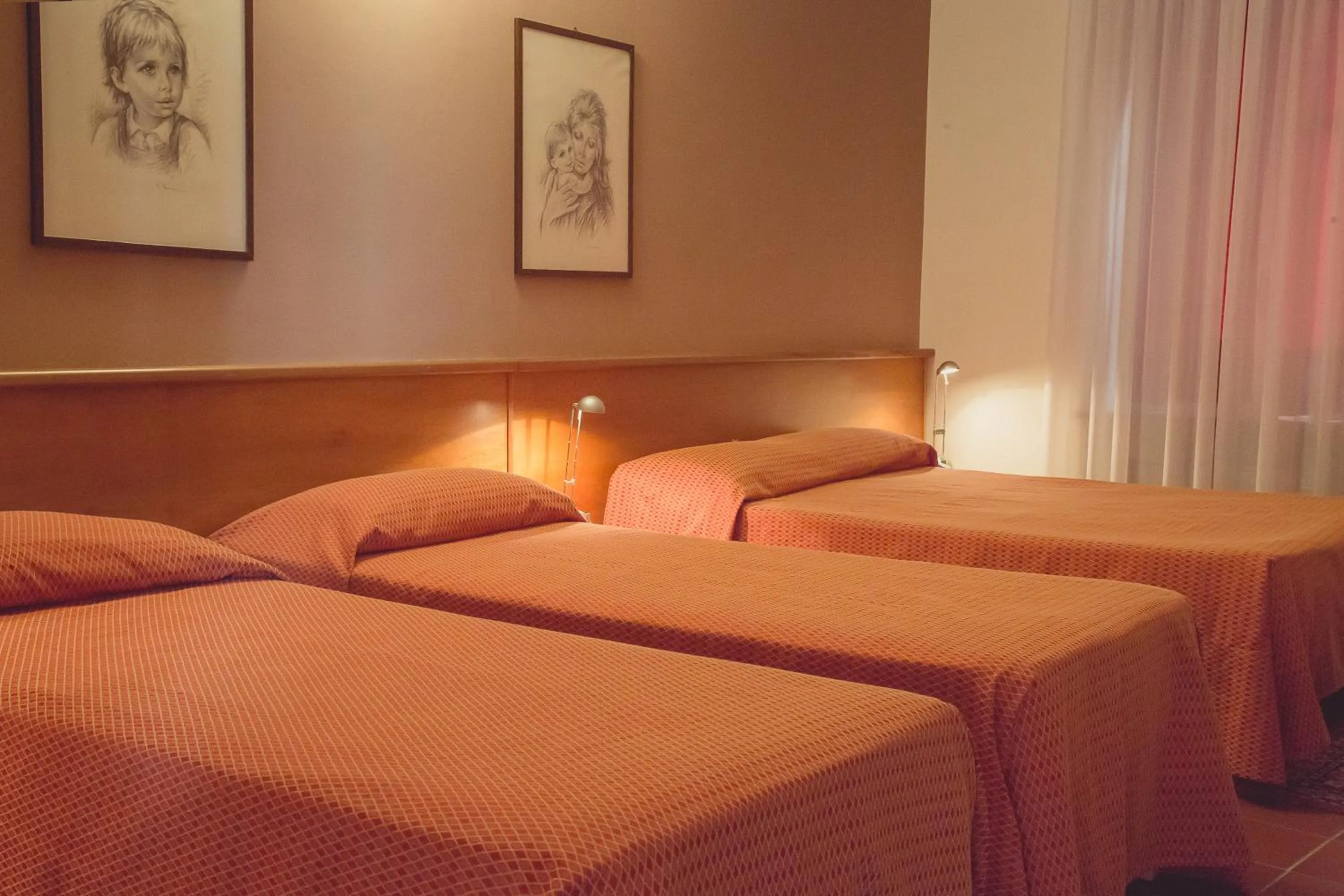 Bed in Hotel Rainero