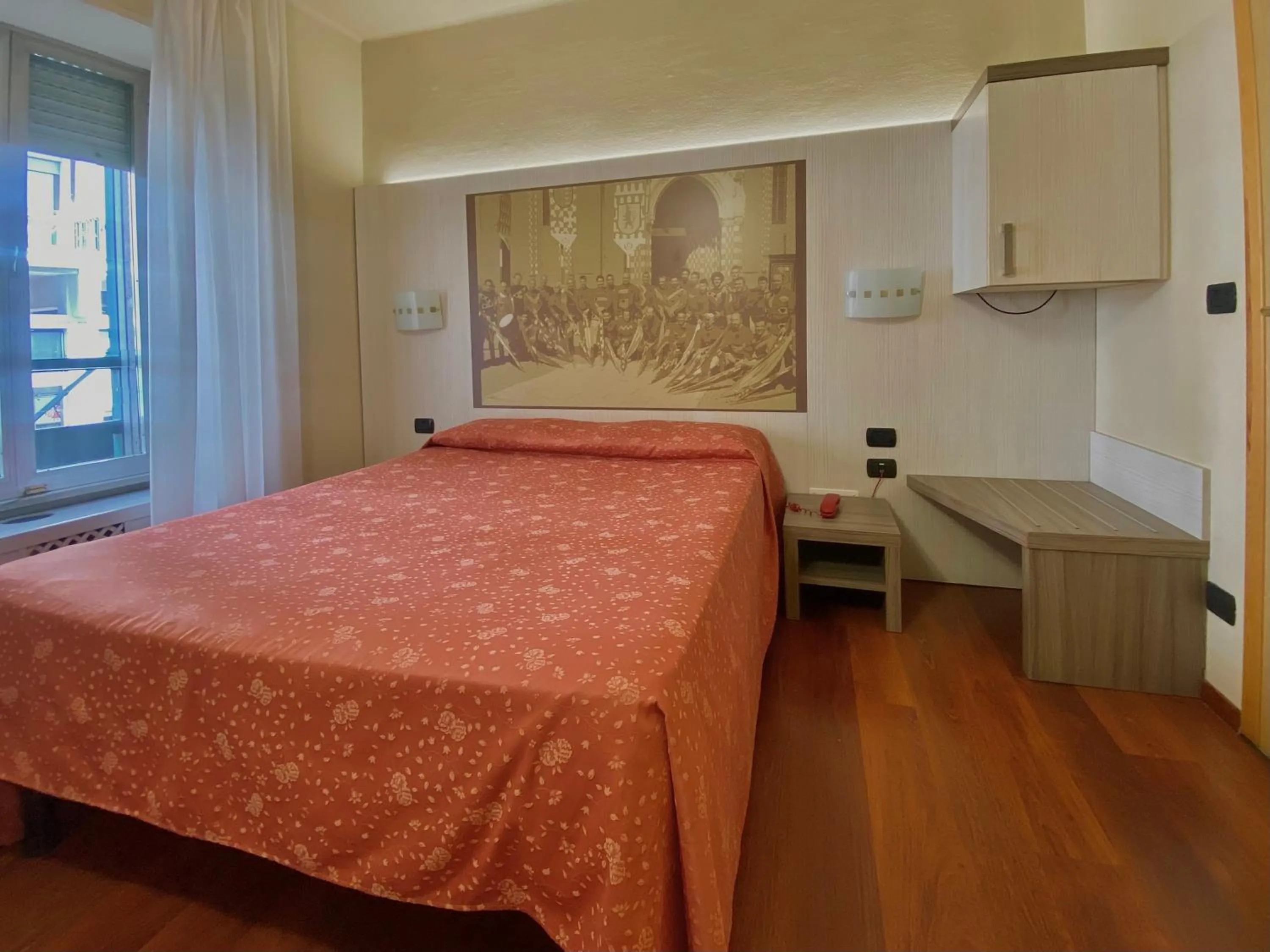 Bed in Hotel Rainero