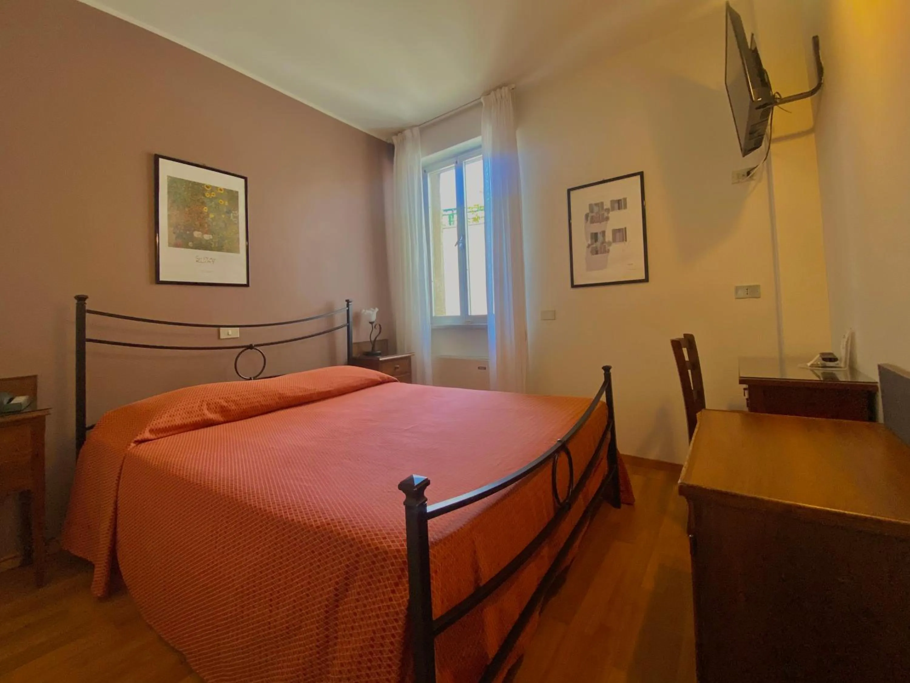 Bed in Hotel Rainero