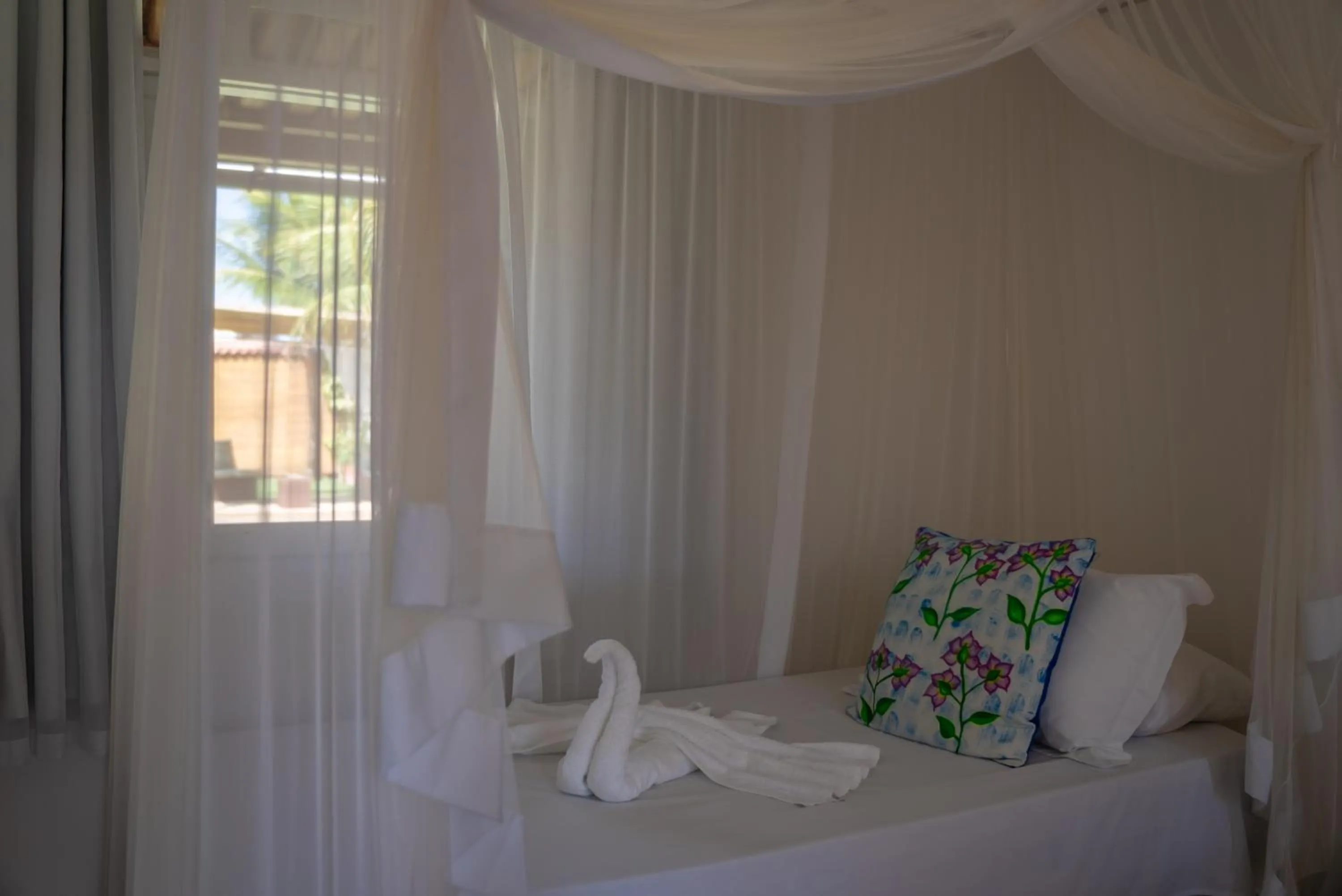 Bed in Pousada Recanto Trancoso