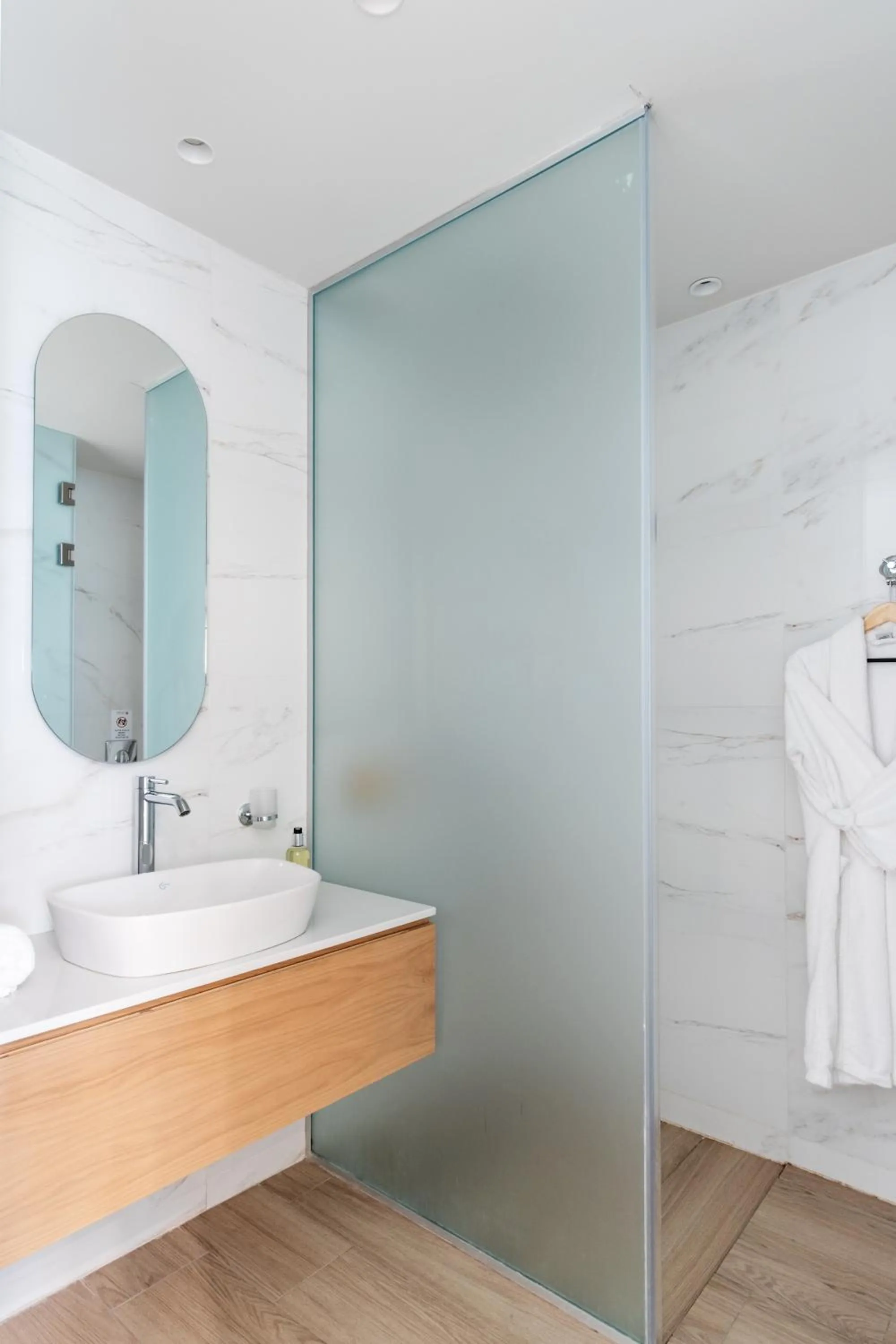 Bathroom in The City Hotel & Suites