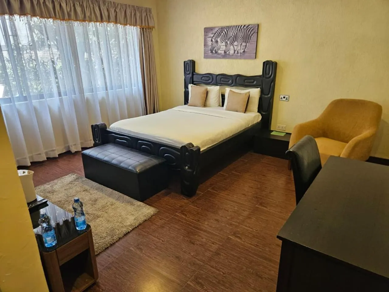 Bed in Progressive Park Hotel