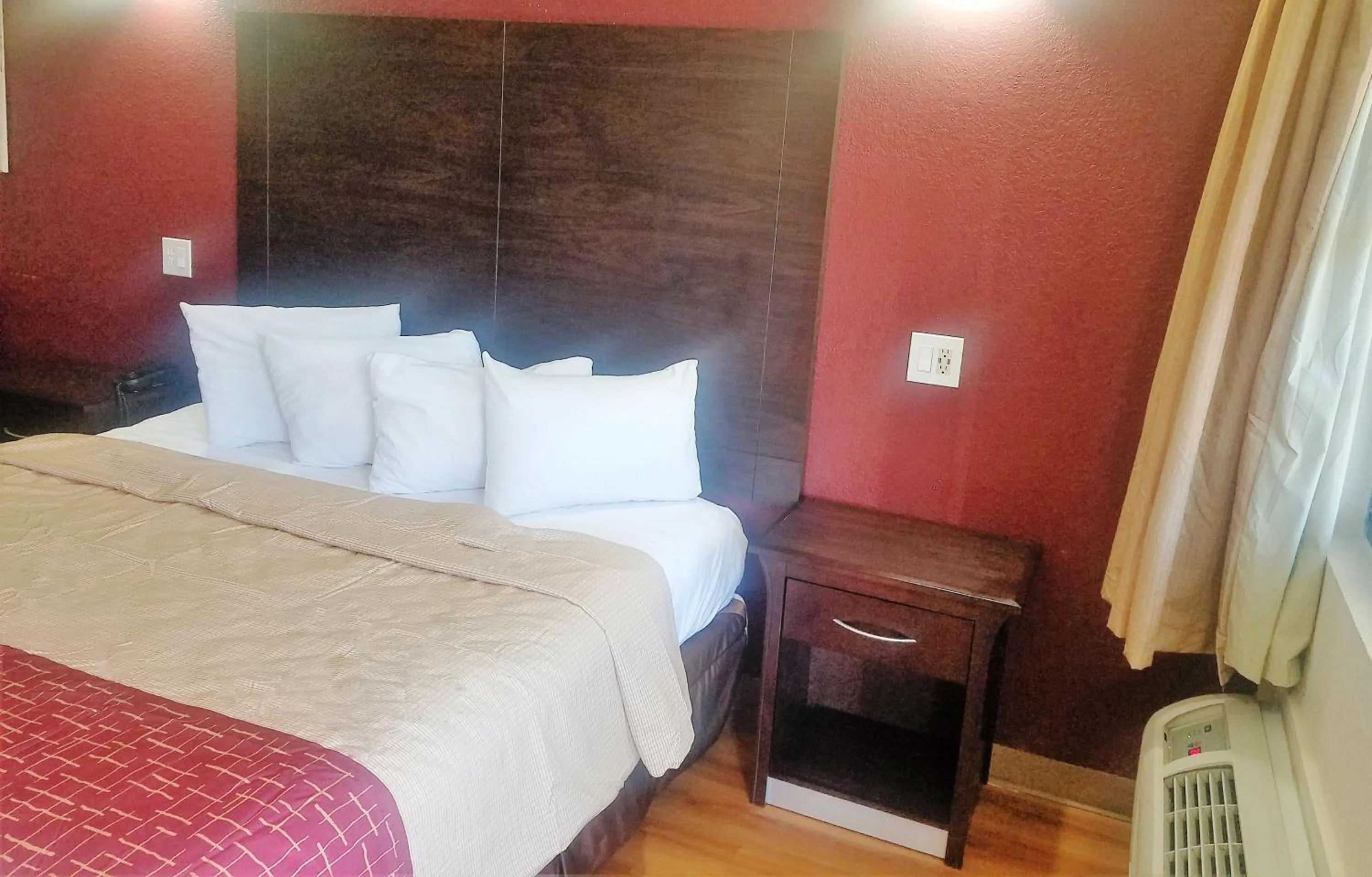 Photo of the whole room in Red Roof Inn & Suites Houston - Hobby Airport