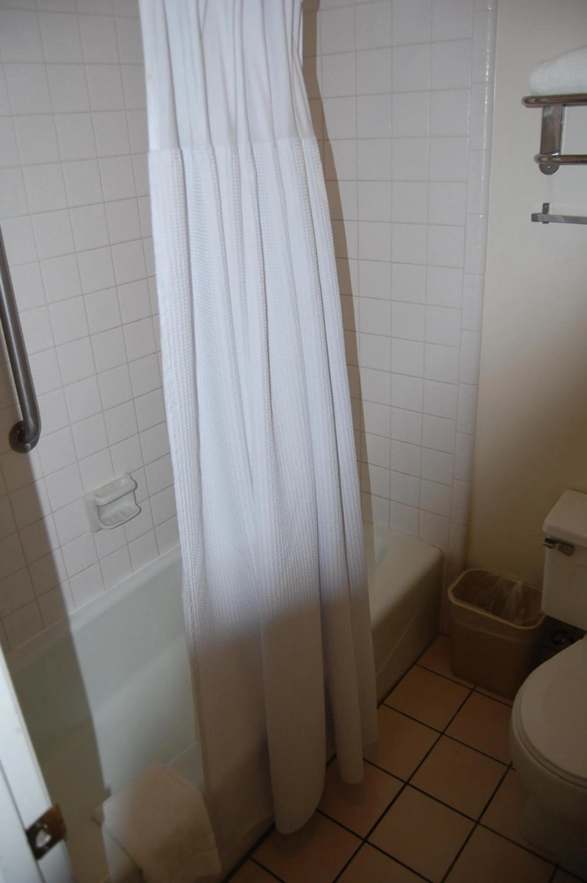 Toilet in Western Inn Lakewood