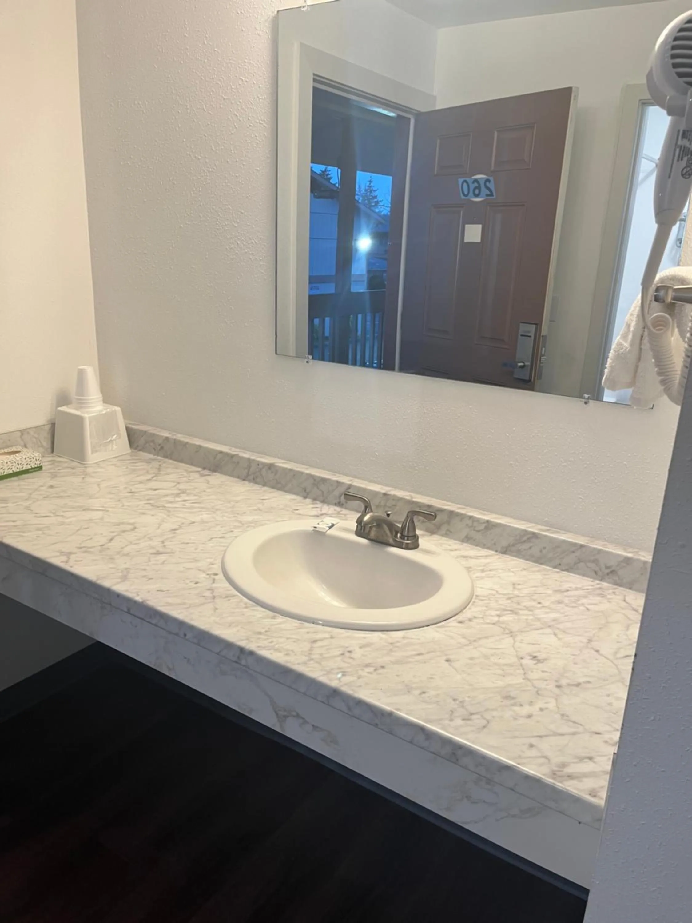 Toilet in Western Inn Lakewood