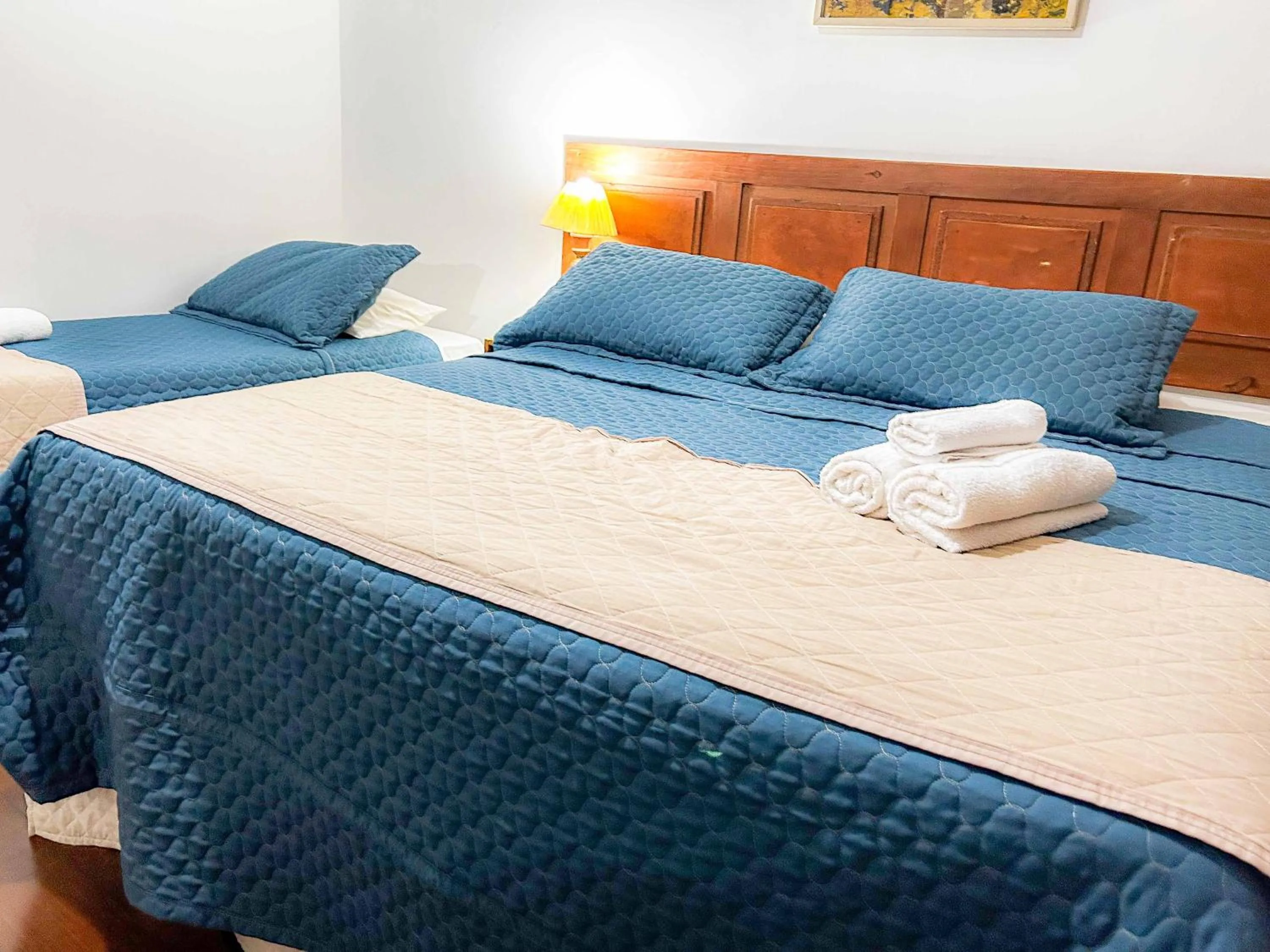 Bed in Pousada dos Sinos