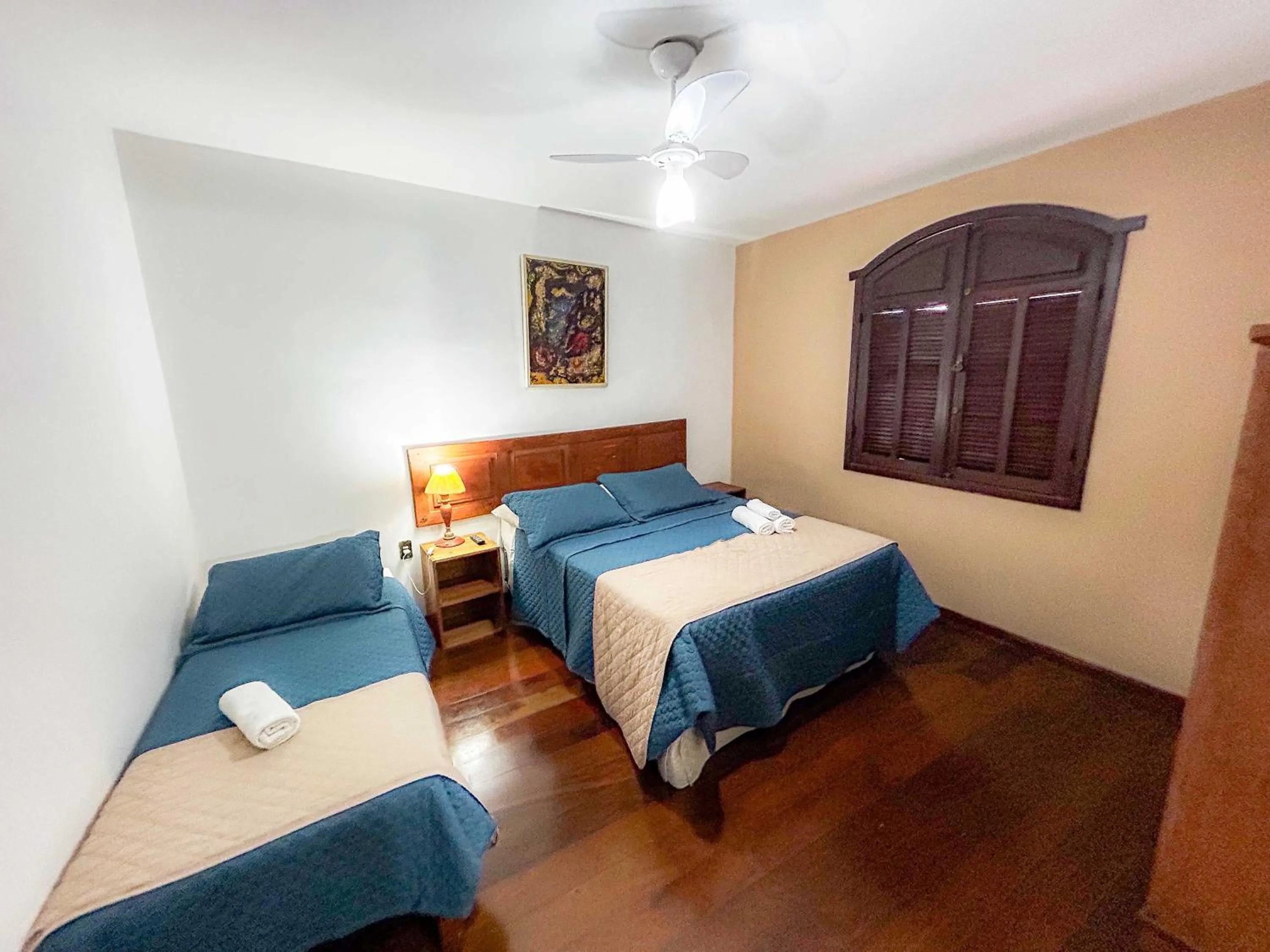 Bed in Pousada dos Sinos