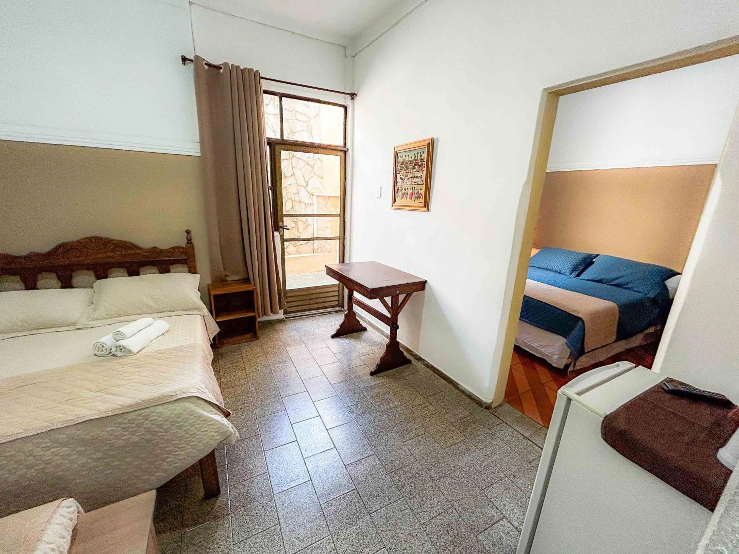 Bed in Pousada dos Sinos