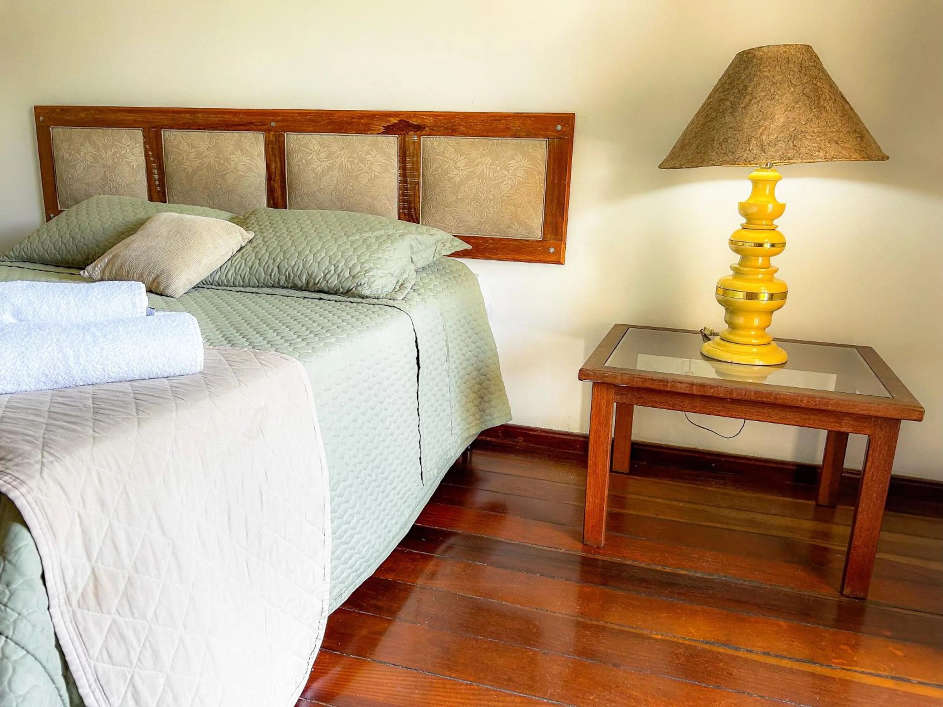 Bed in Pousada dos Sinos