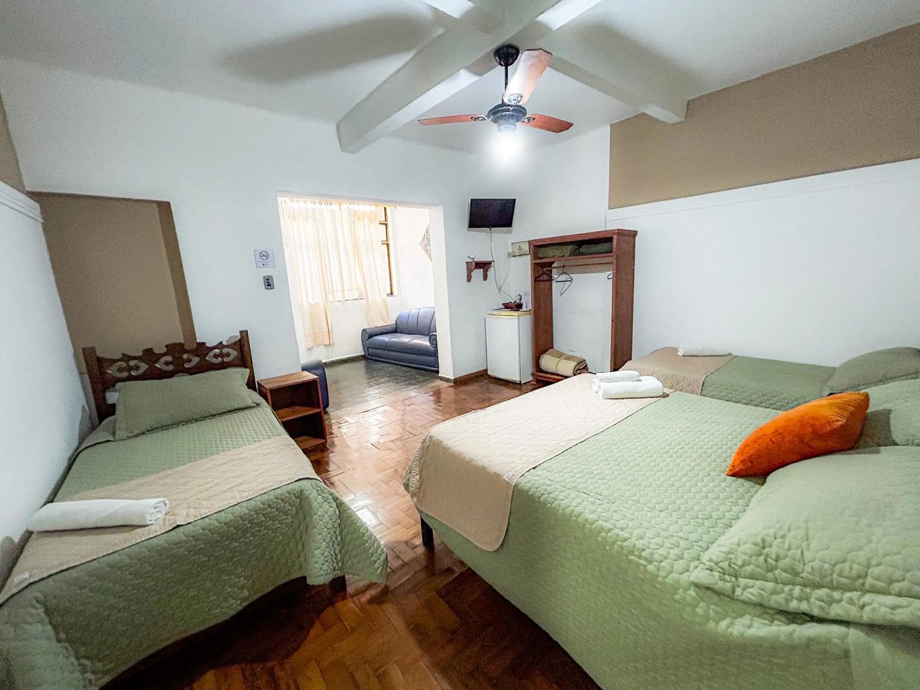 Bed in Pousada dos Sinos