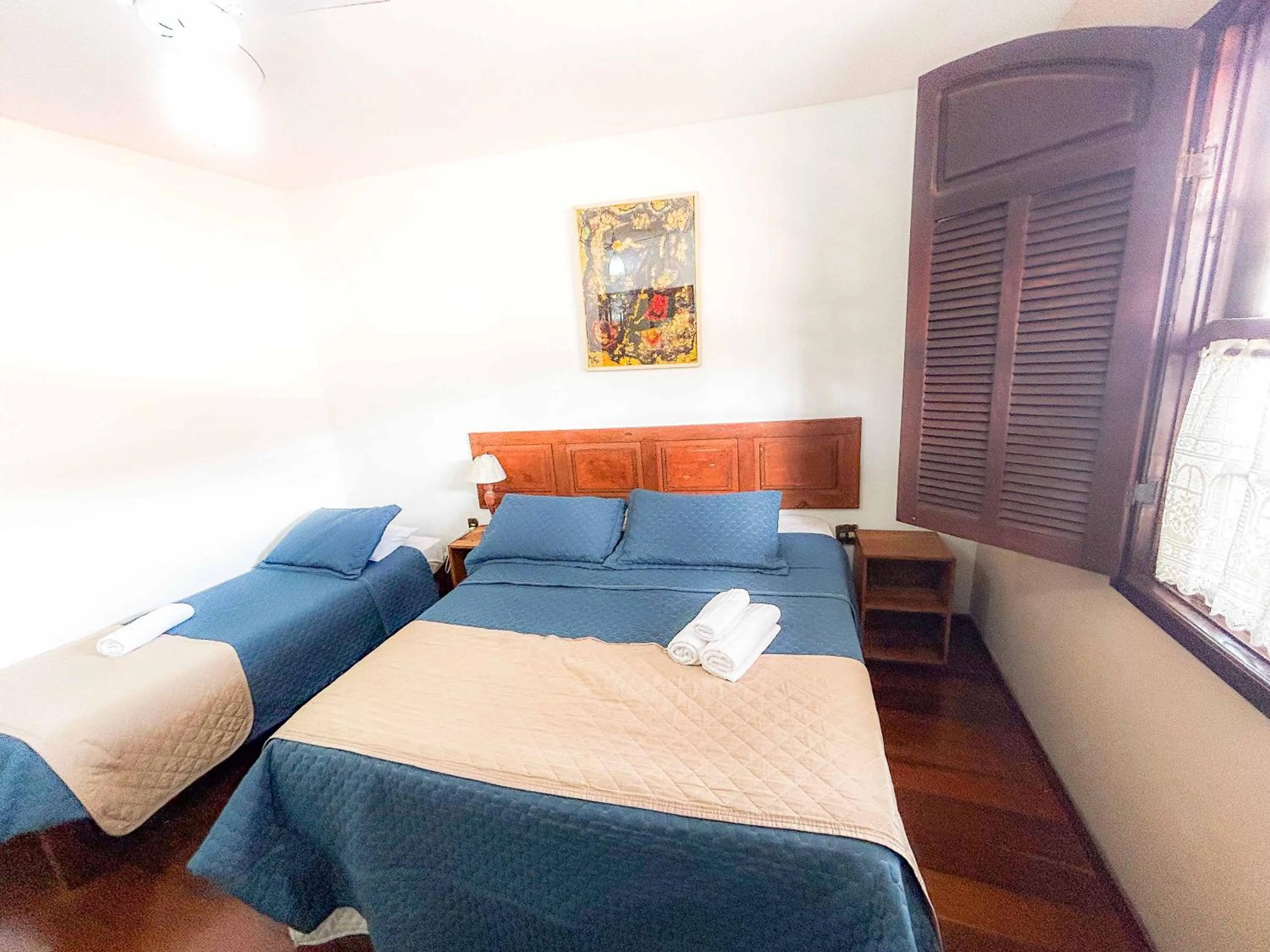 Bed in Pousada dos Sinos