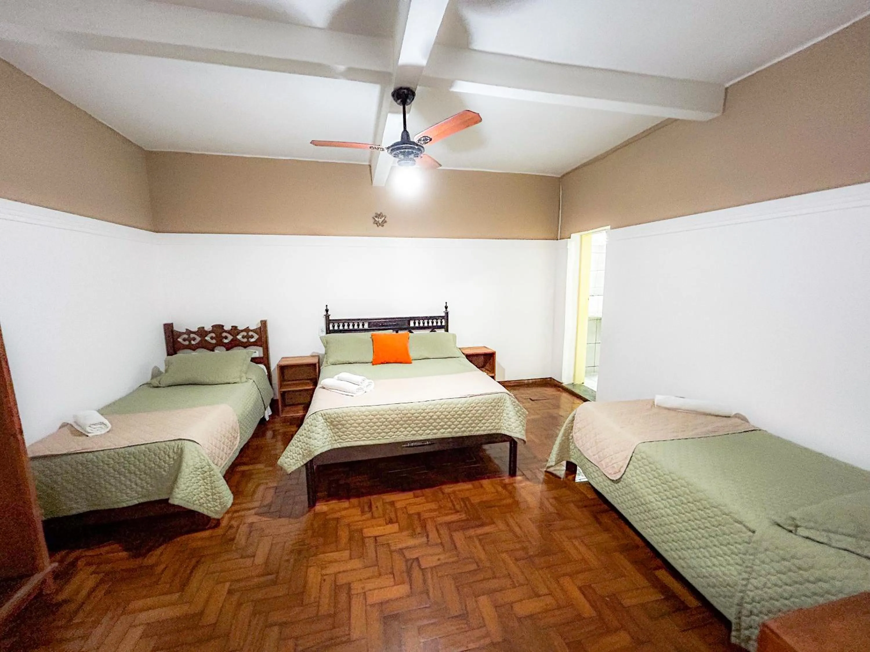 Bed in Pousada dos Sinos