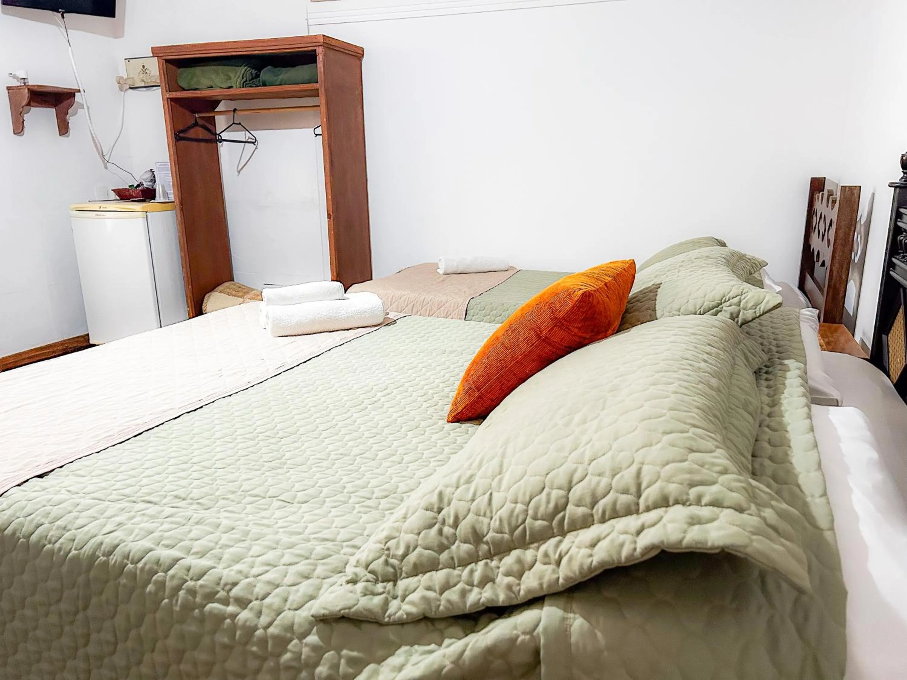 Bed in Pousada dos Sinos