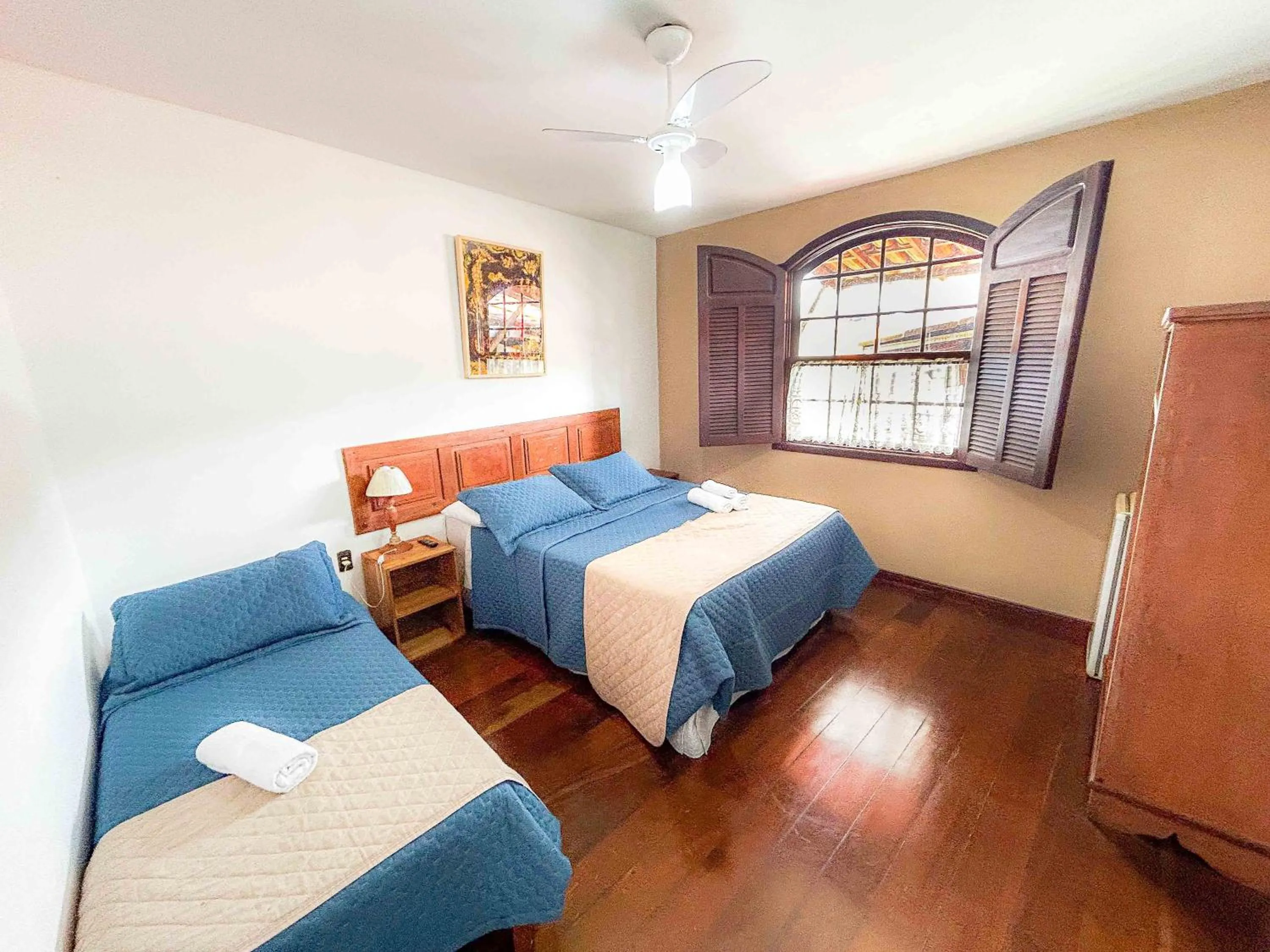 Bed in Pousada dos Sinos