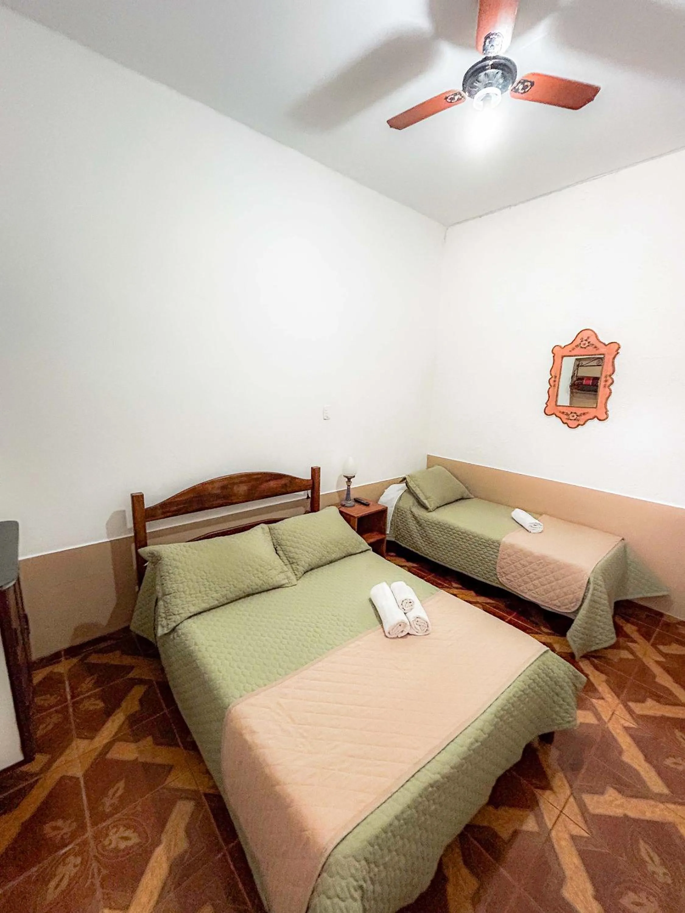 Bed in Pousada dos Sinos