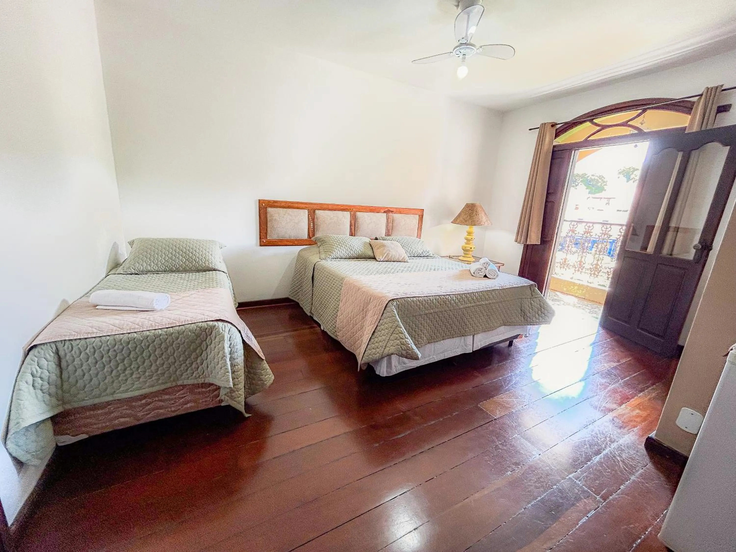 Bed in Pousada dos Sinos