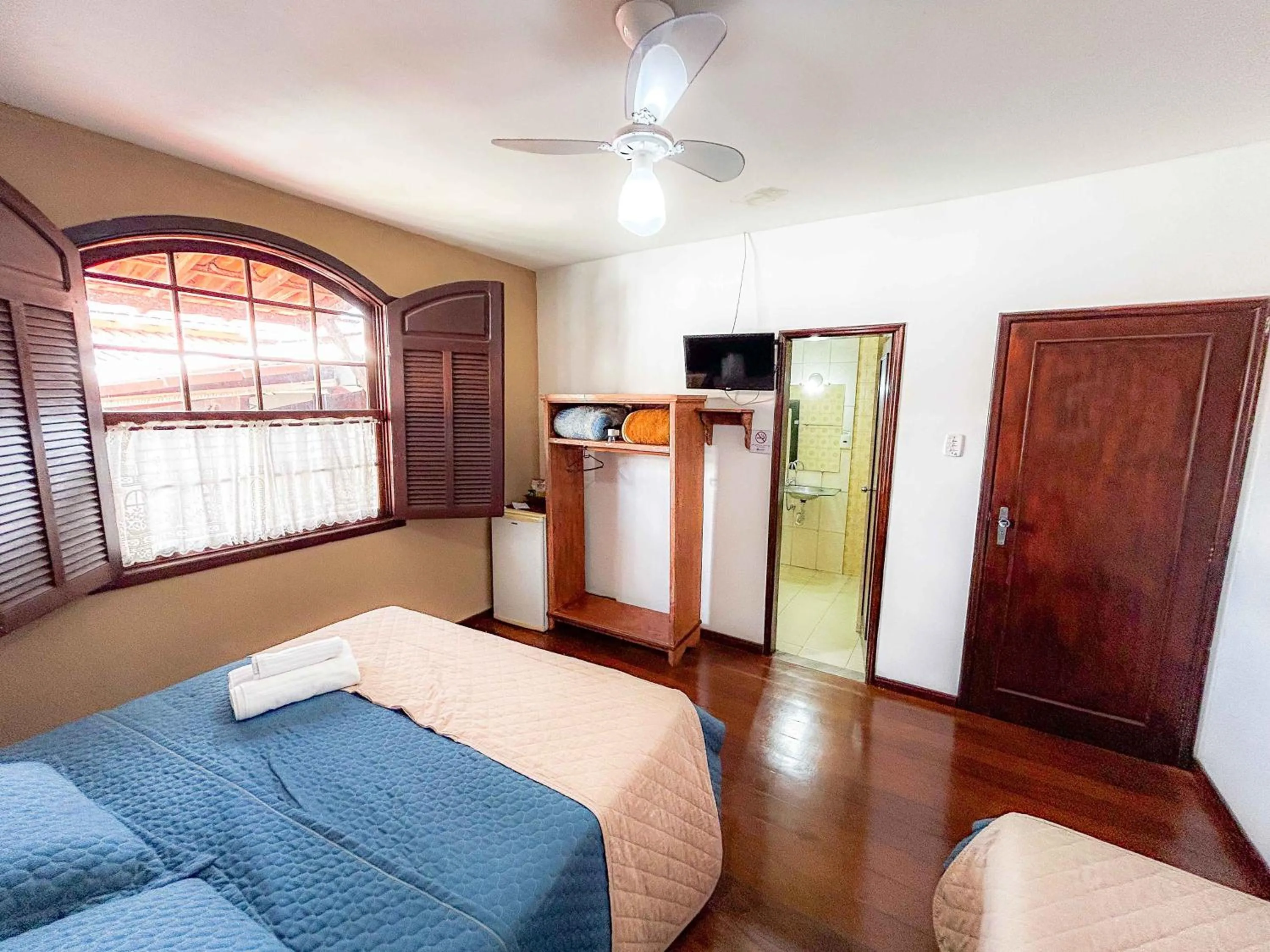 Bed in Pousada dos Sinos