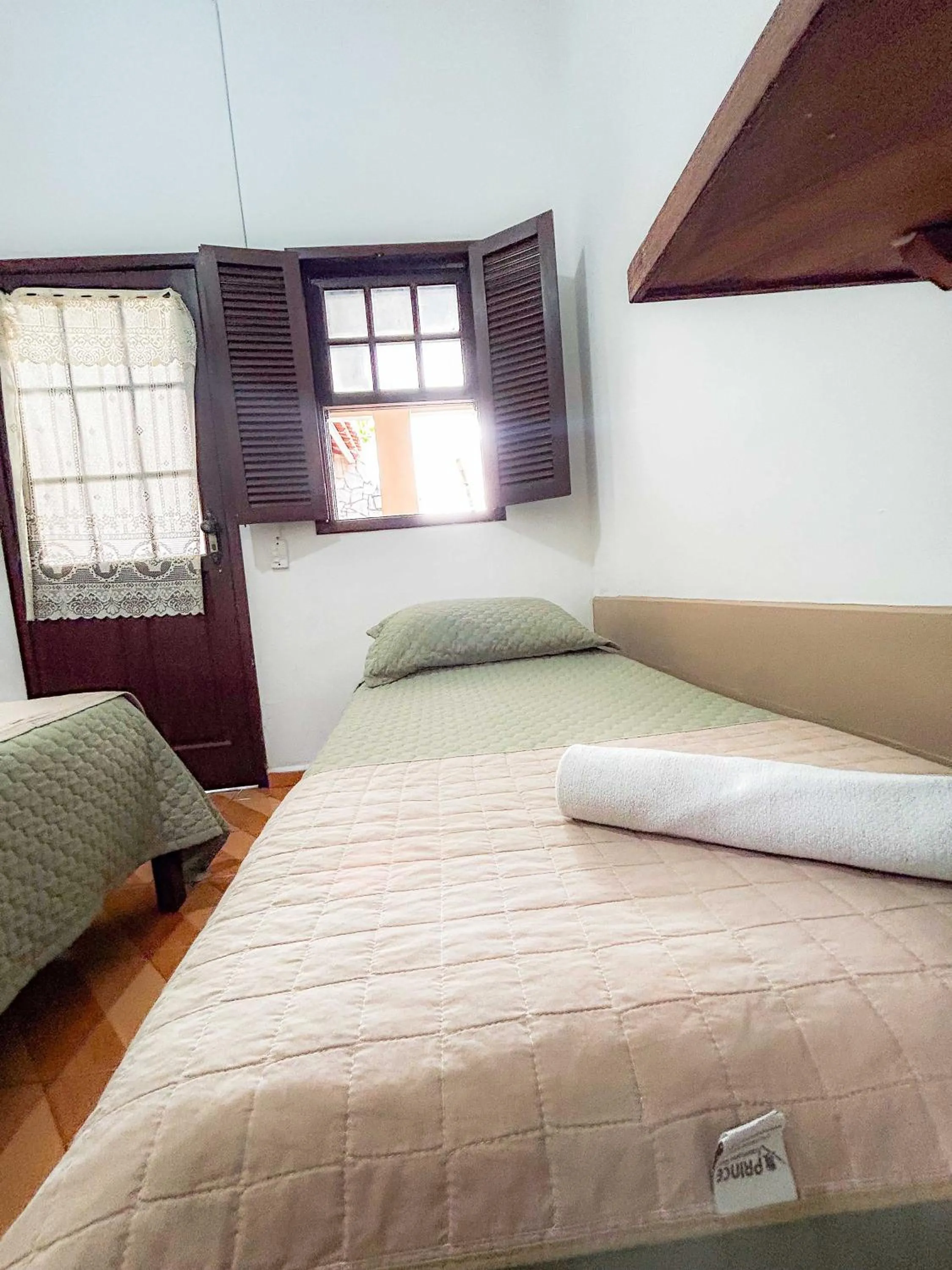 Bed in Pousada dos Sinos