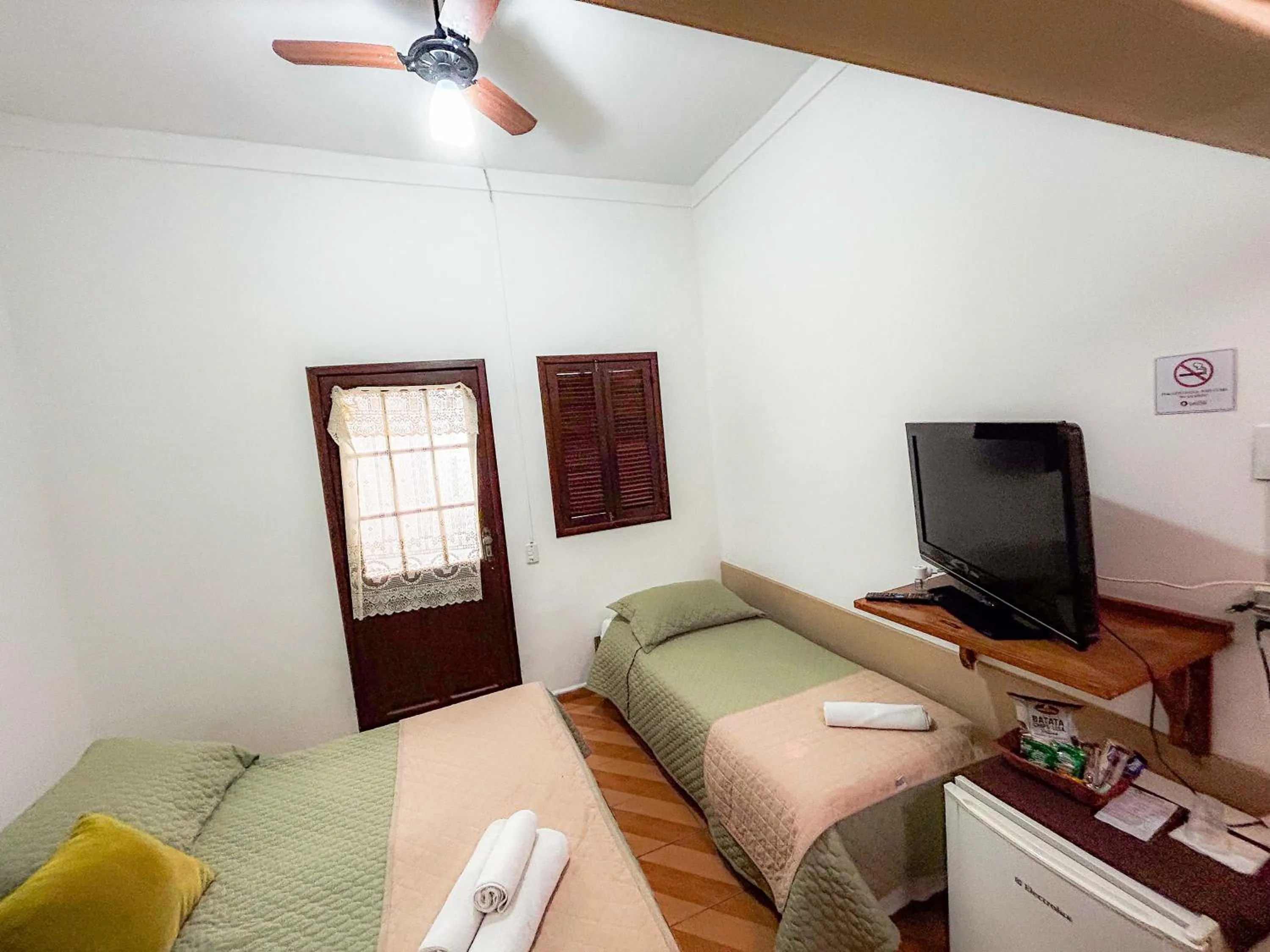 Bed in Pousada dos Sinos