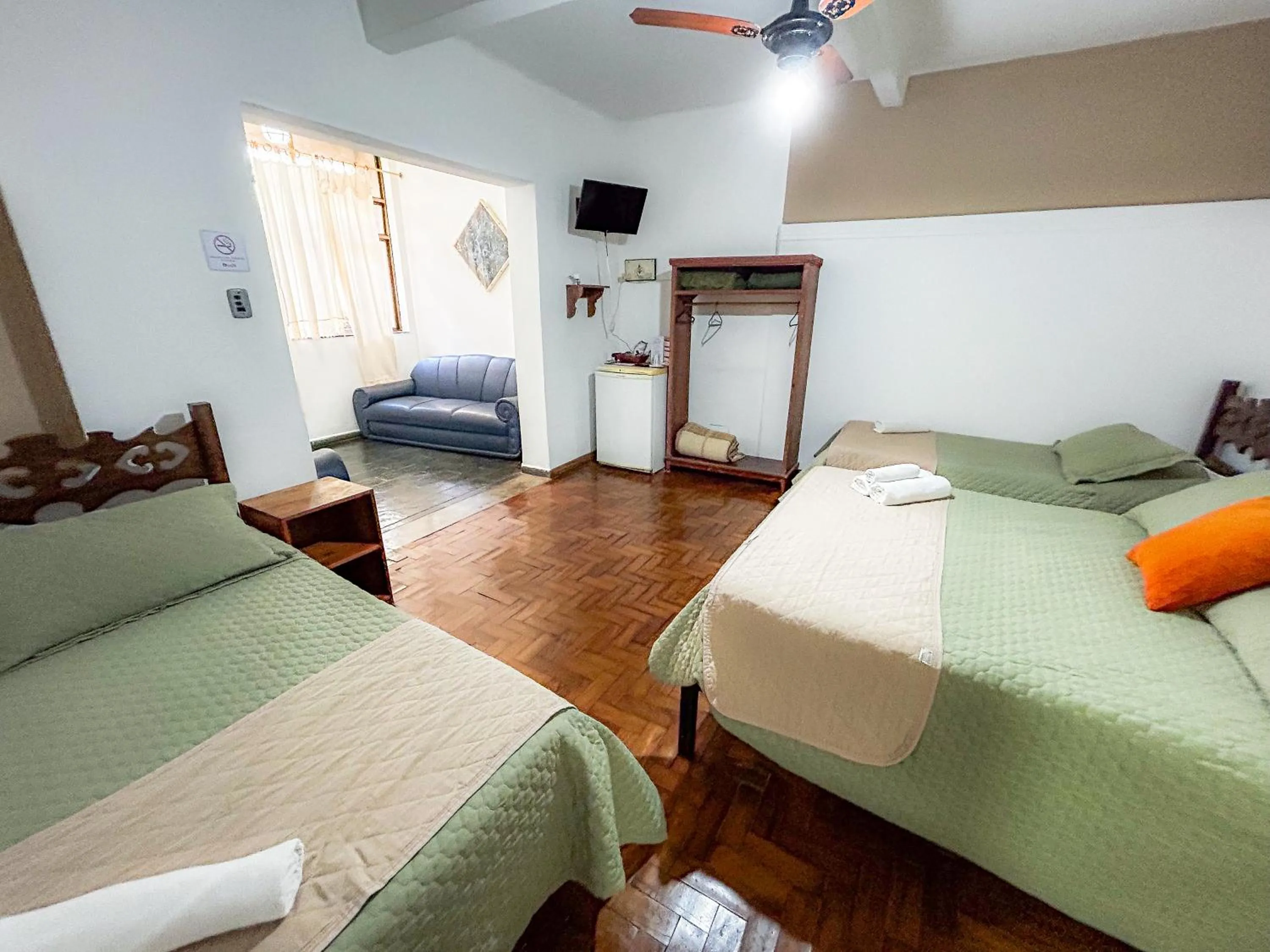 Bed in Pousada dos Sinos